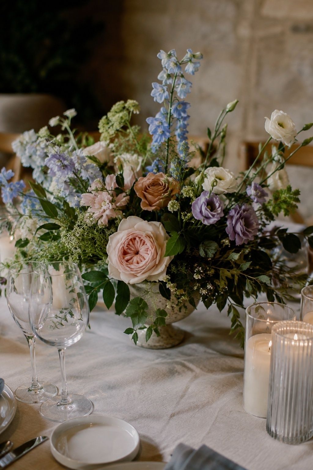 Pastel wedding florals with plenty of greenery