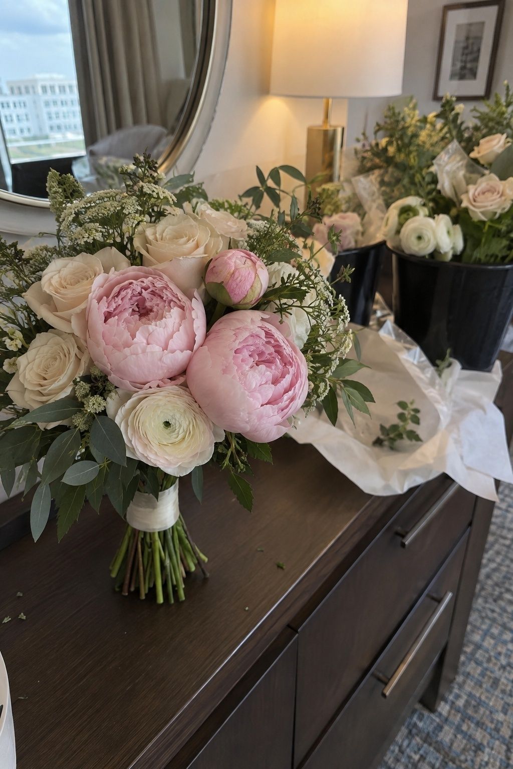 Late-April peonies alongside backup spring blooms