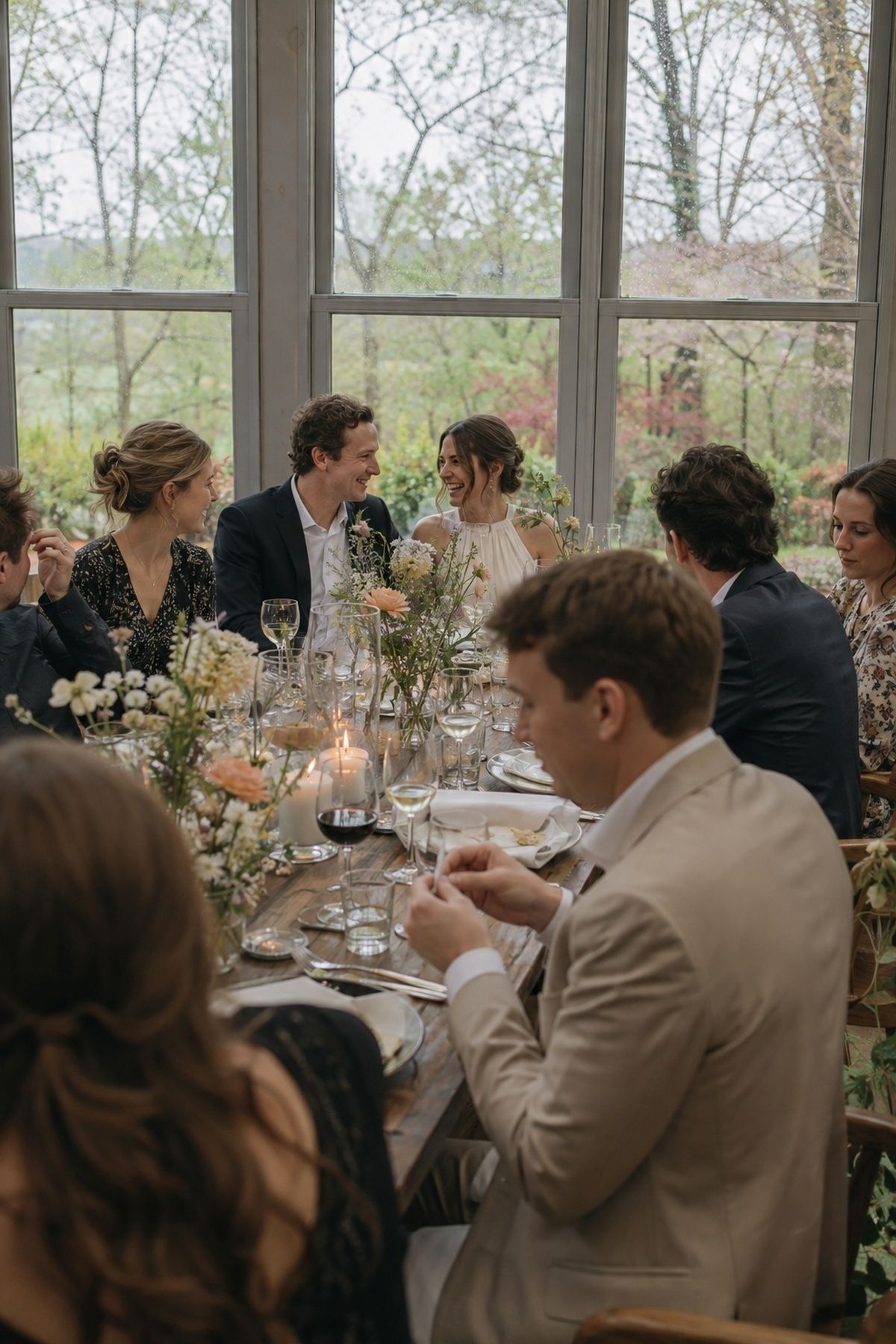 Guests seated close together for a garden-dinner feel
