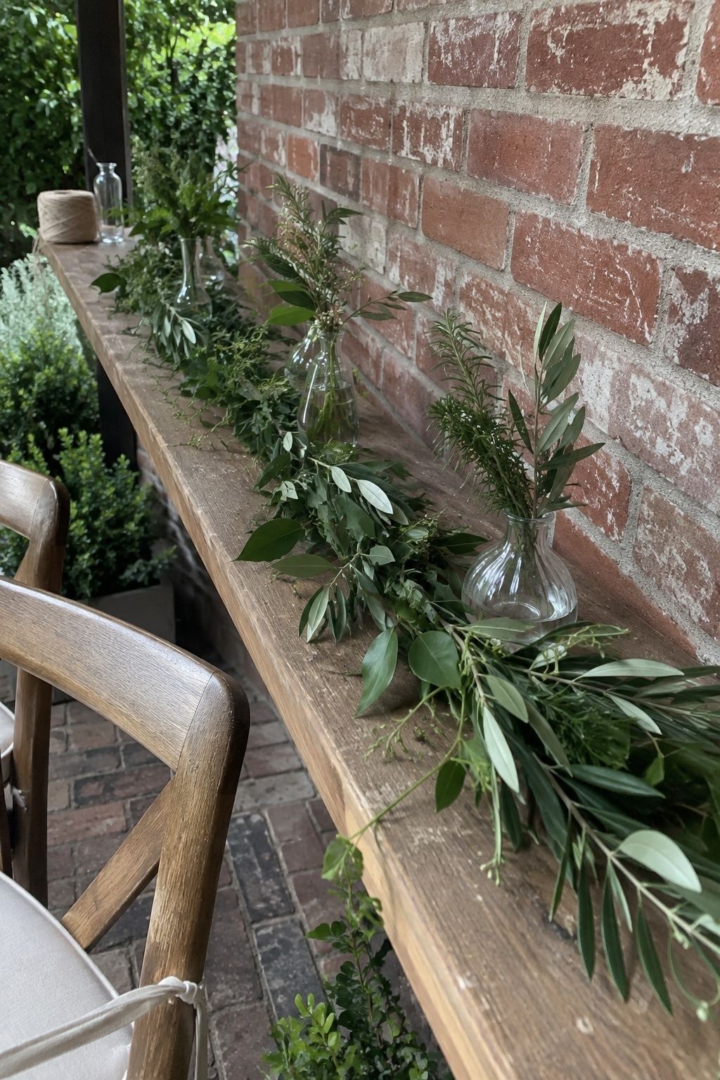 Fresh seasonal greenery mixed with summer blooms