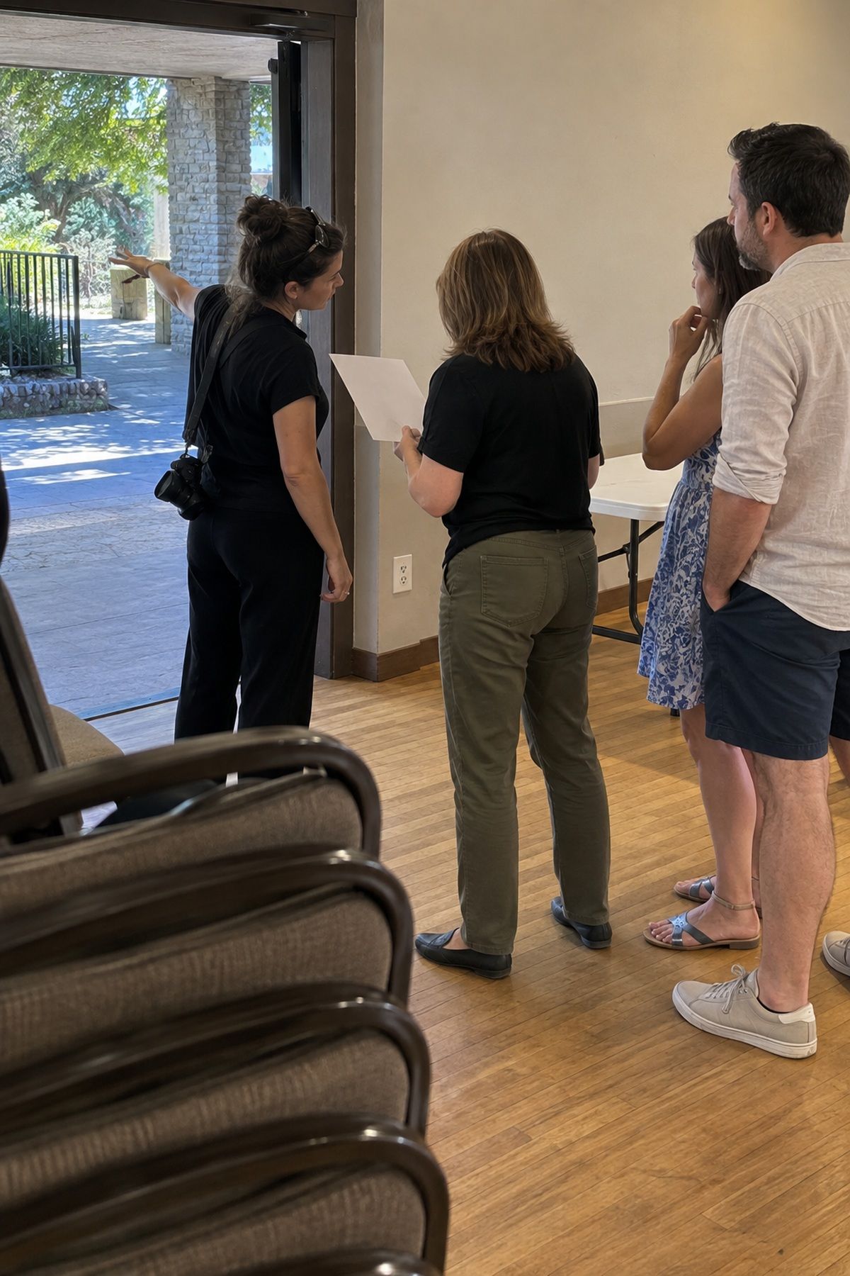 A photographer and venue coordinator walk through access needs before an August wedding.
