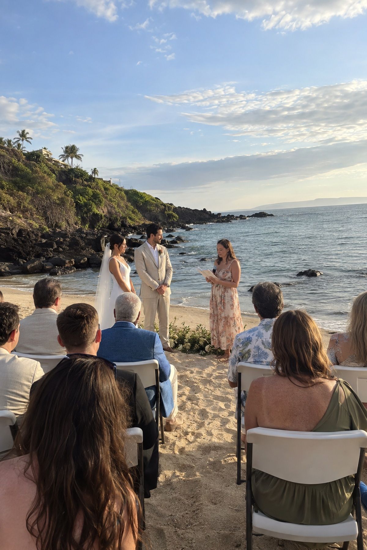 Guests remain relaxed during a short clearly paced beach wedding ceremony.