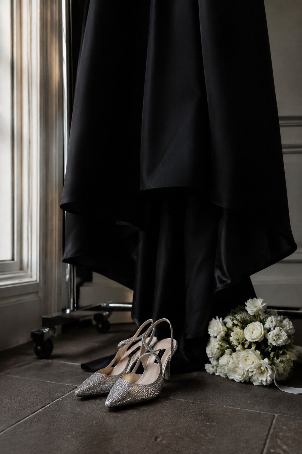 Black wedding dress paired with rhinestone heels
