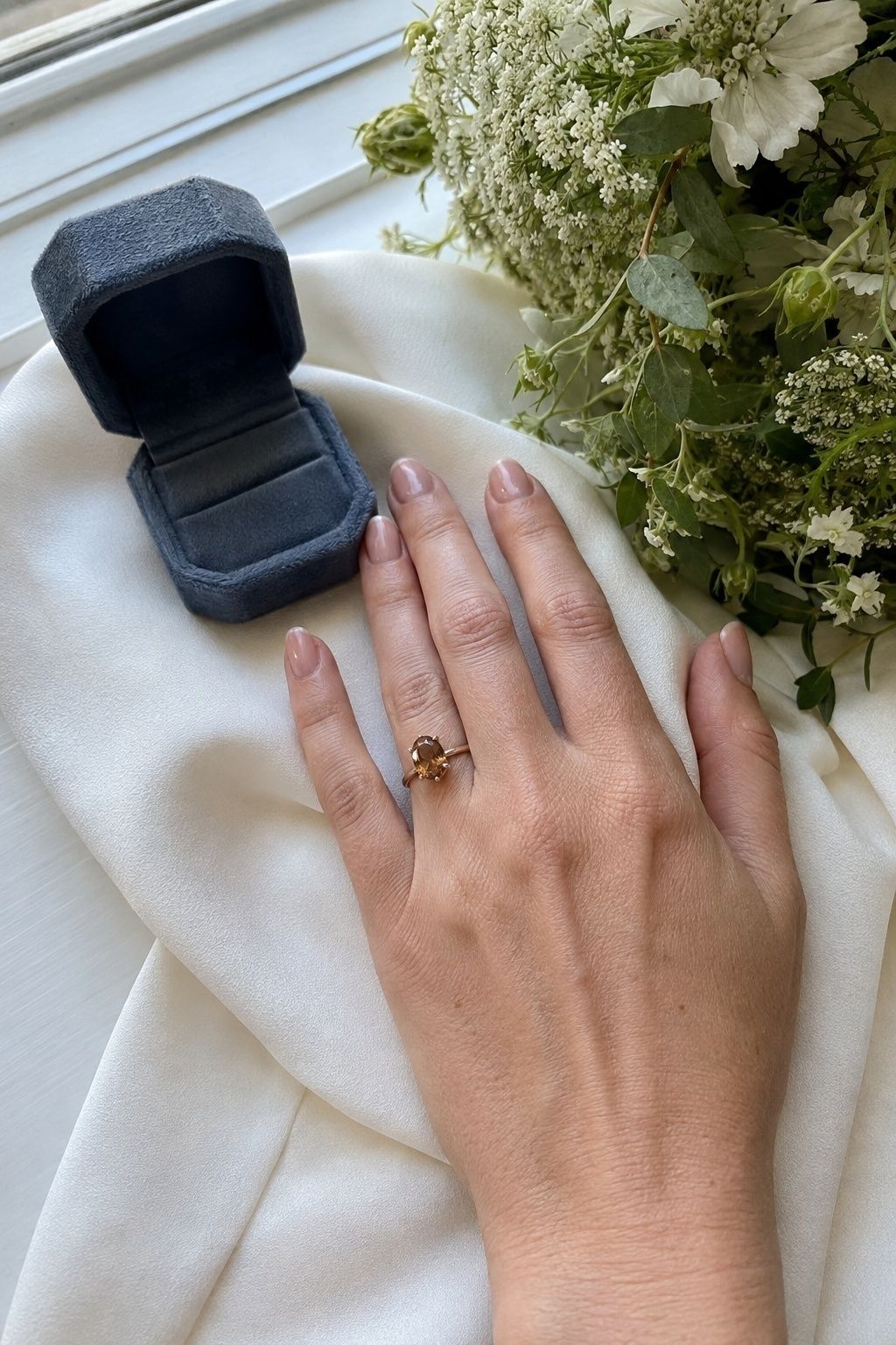 Brown diamond ring in a small-wedding detail photo