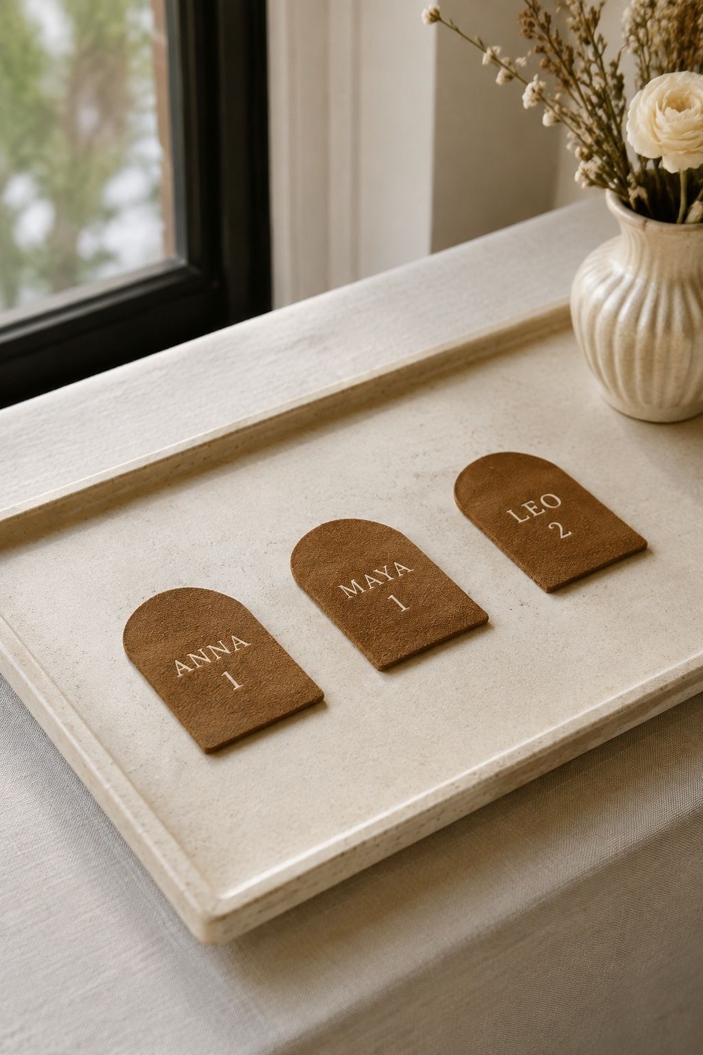 Leather or suede escort cards