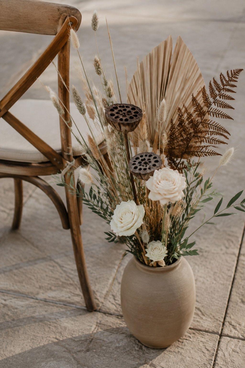 Dried brown florals with grasses and seed pods