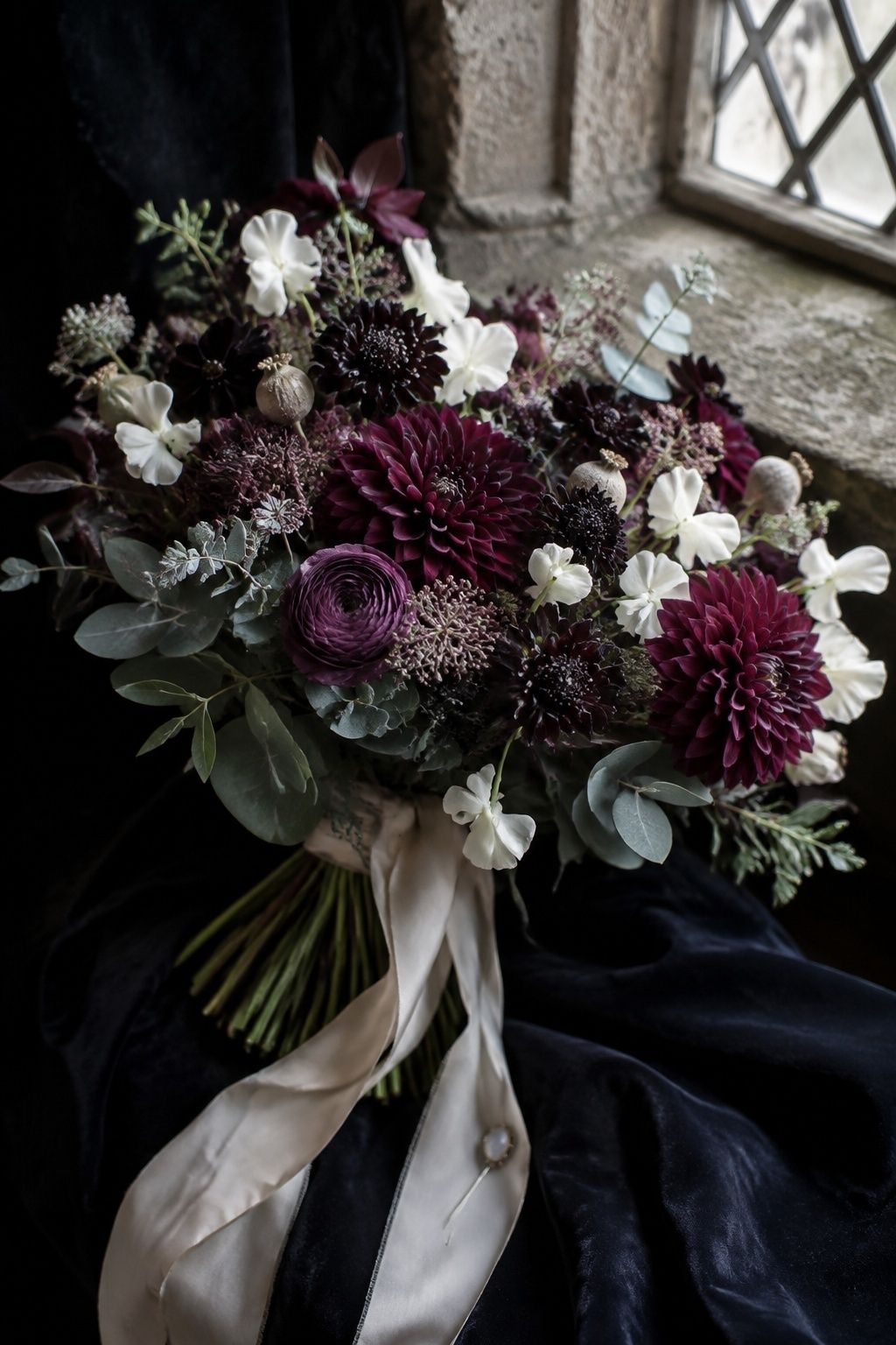 Dark wildflower bridal bouquet
