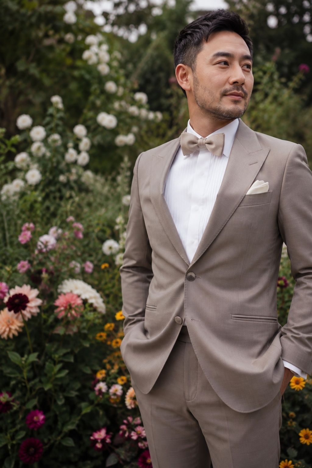 Champagne tuxedo paired with an ivory shirt and tonal bow tie