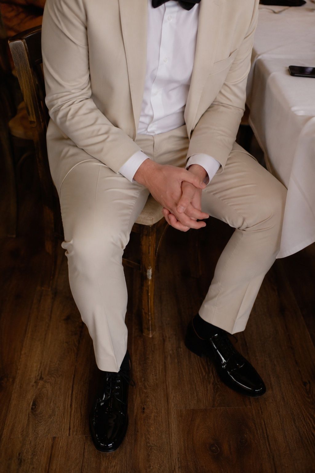 Champagne tuxedo finished with black patent shoes