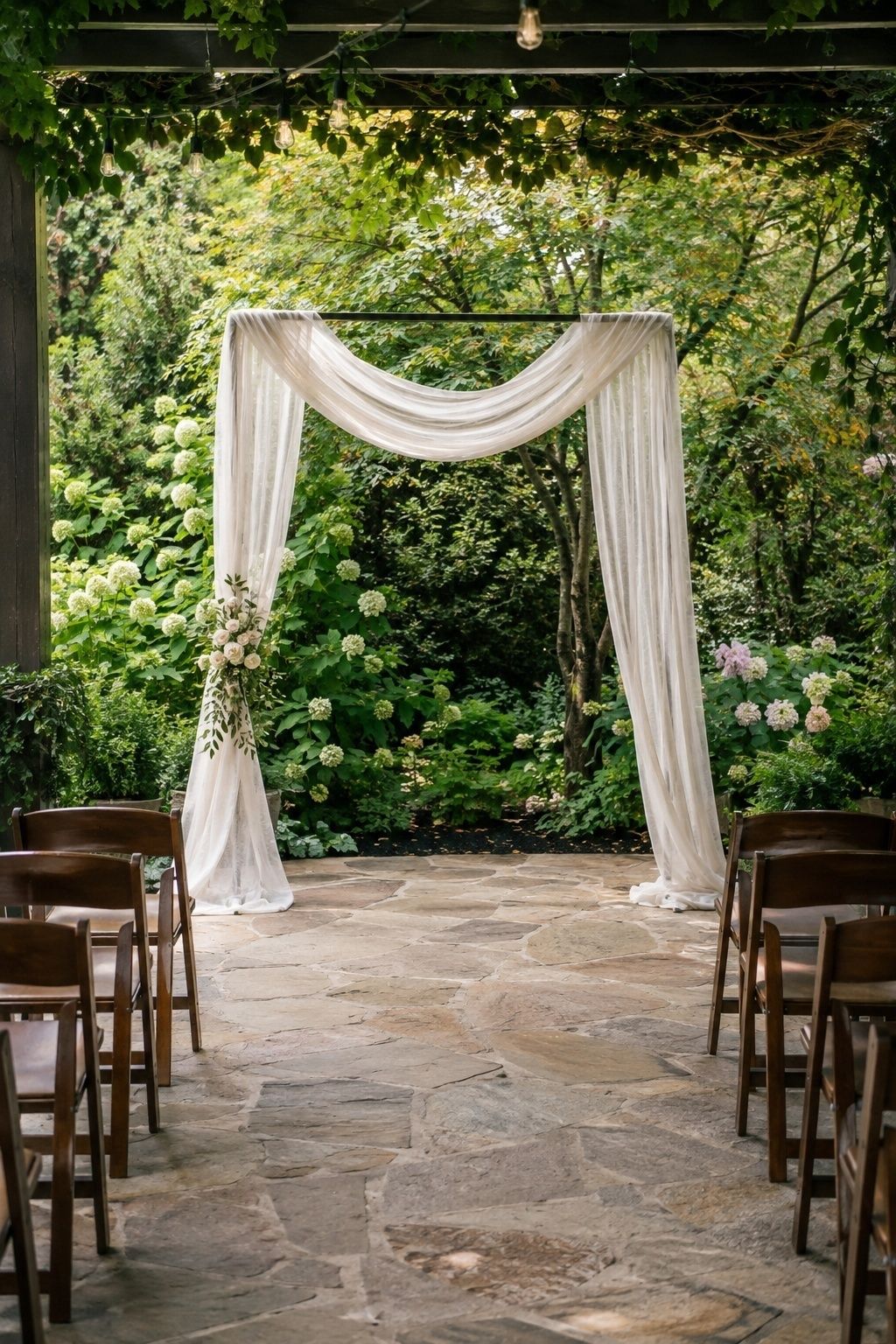 Draped wedding arch with loose side tails