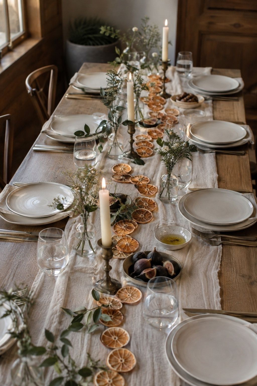 Layer A Citrus Garland Down Small Reception Tables with dried orange wedding garland