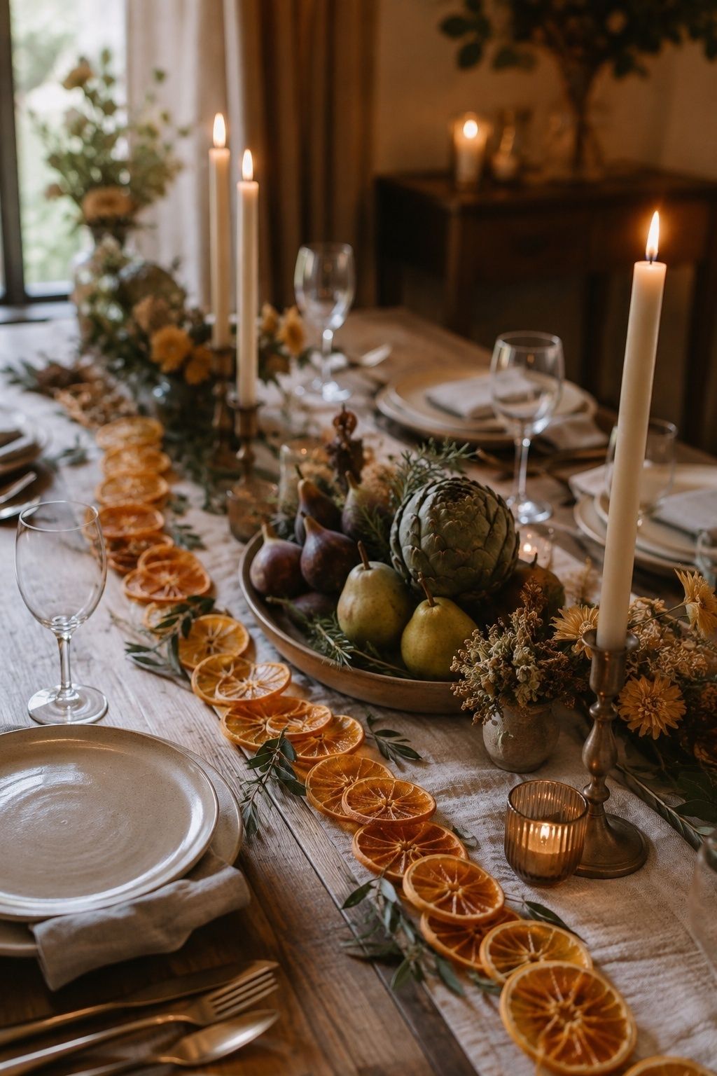 Pair Citrus With Produce Centerpieces with dried orange wedding garland