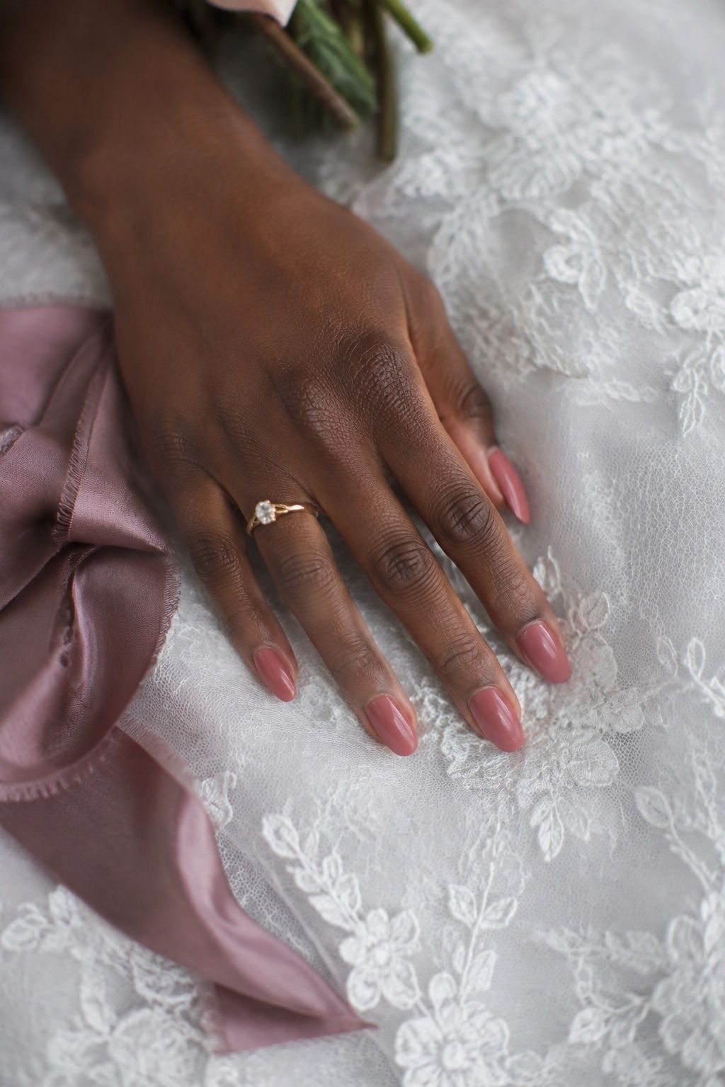Almond-shaped dusty rose bridal nails