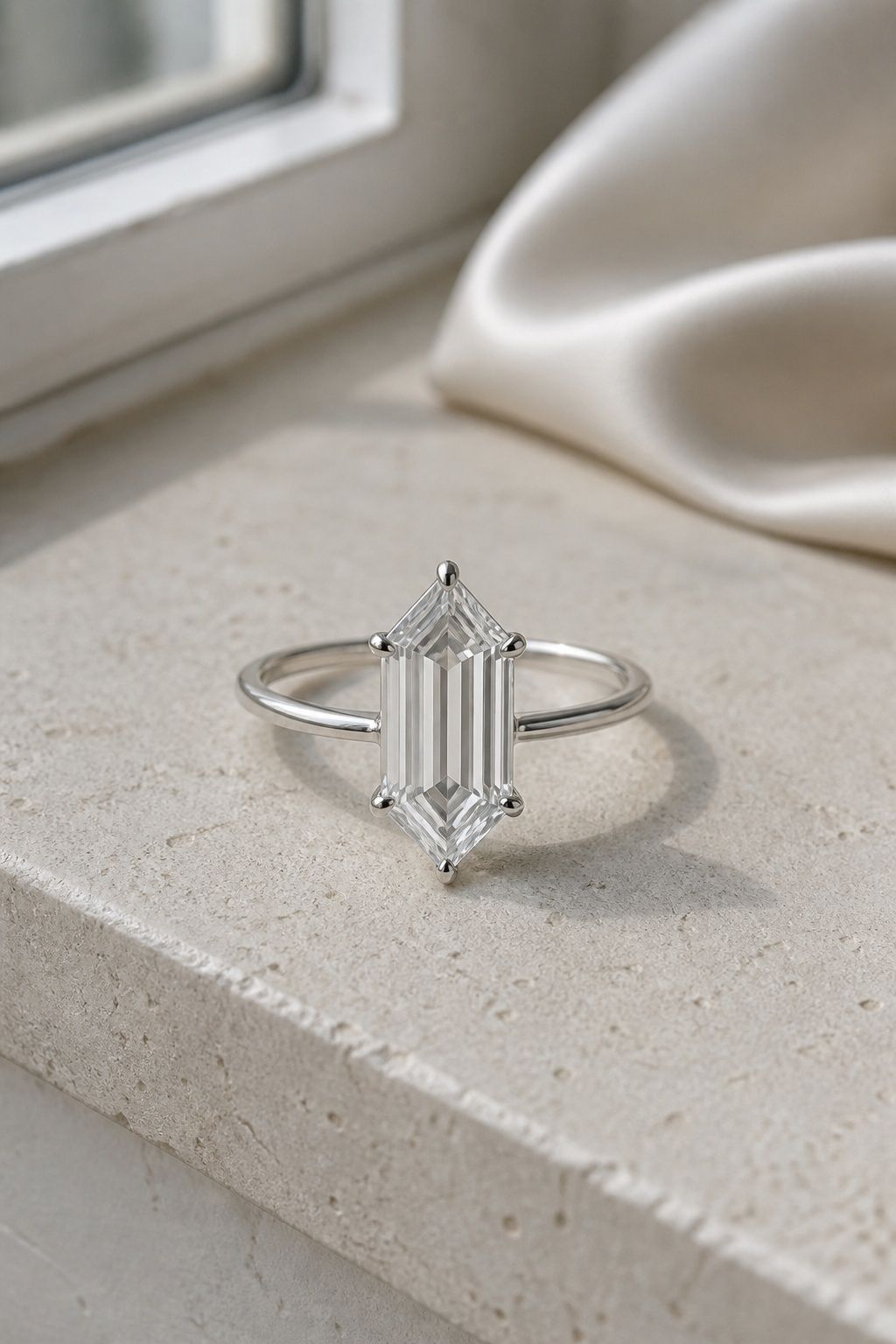 Step-cut hexagon center stone with a glassy look
