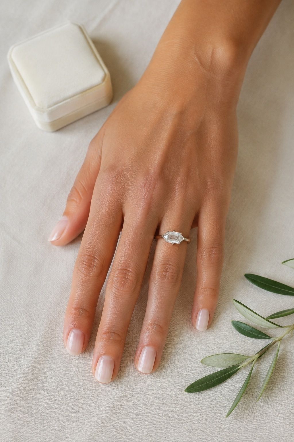 East-west set elongated hexagon ring