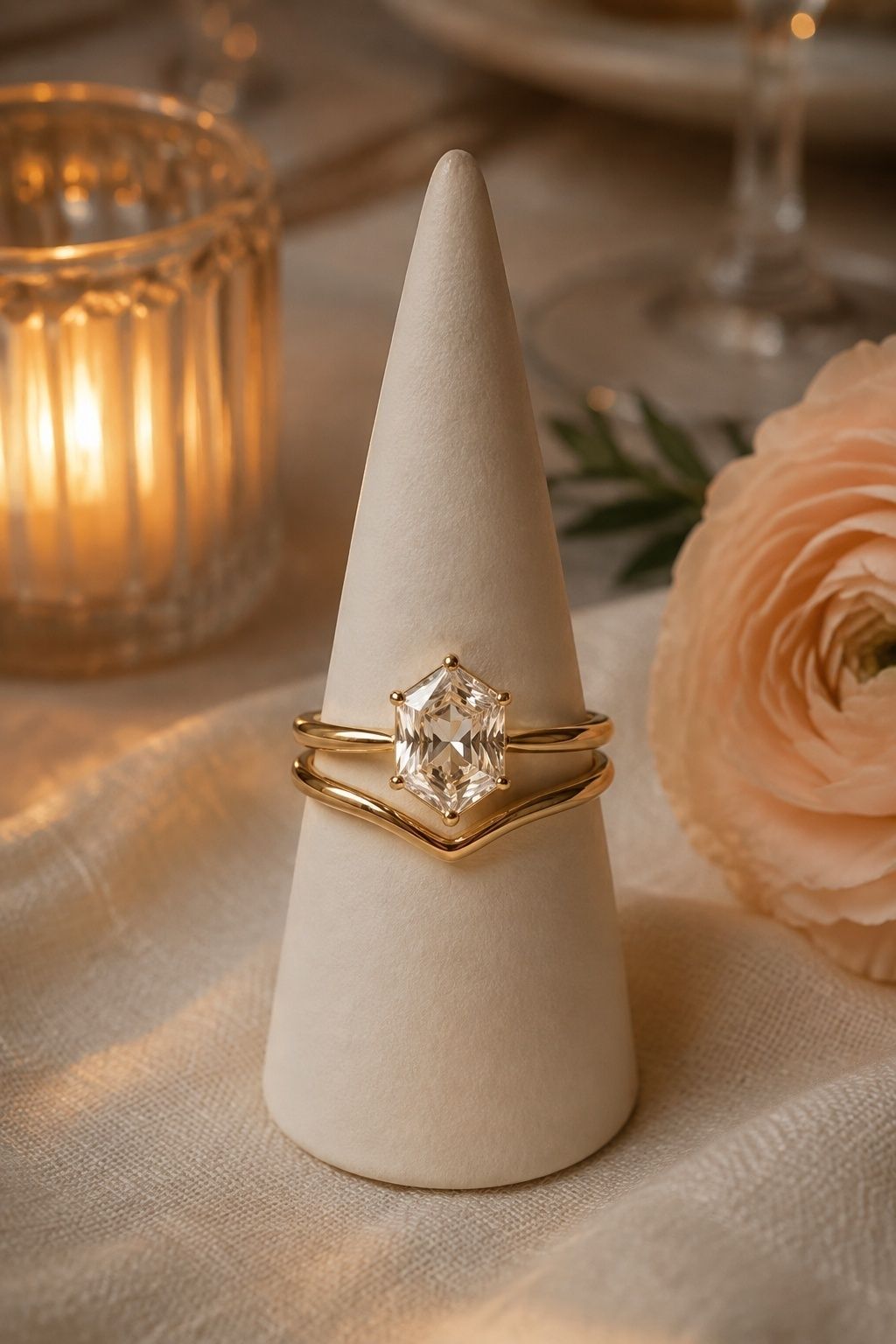 Contoured wedding band stacked with a hexagon ring