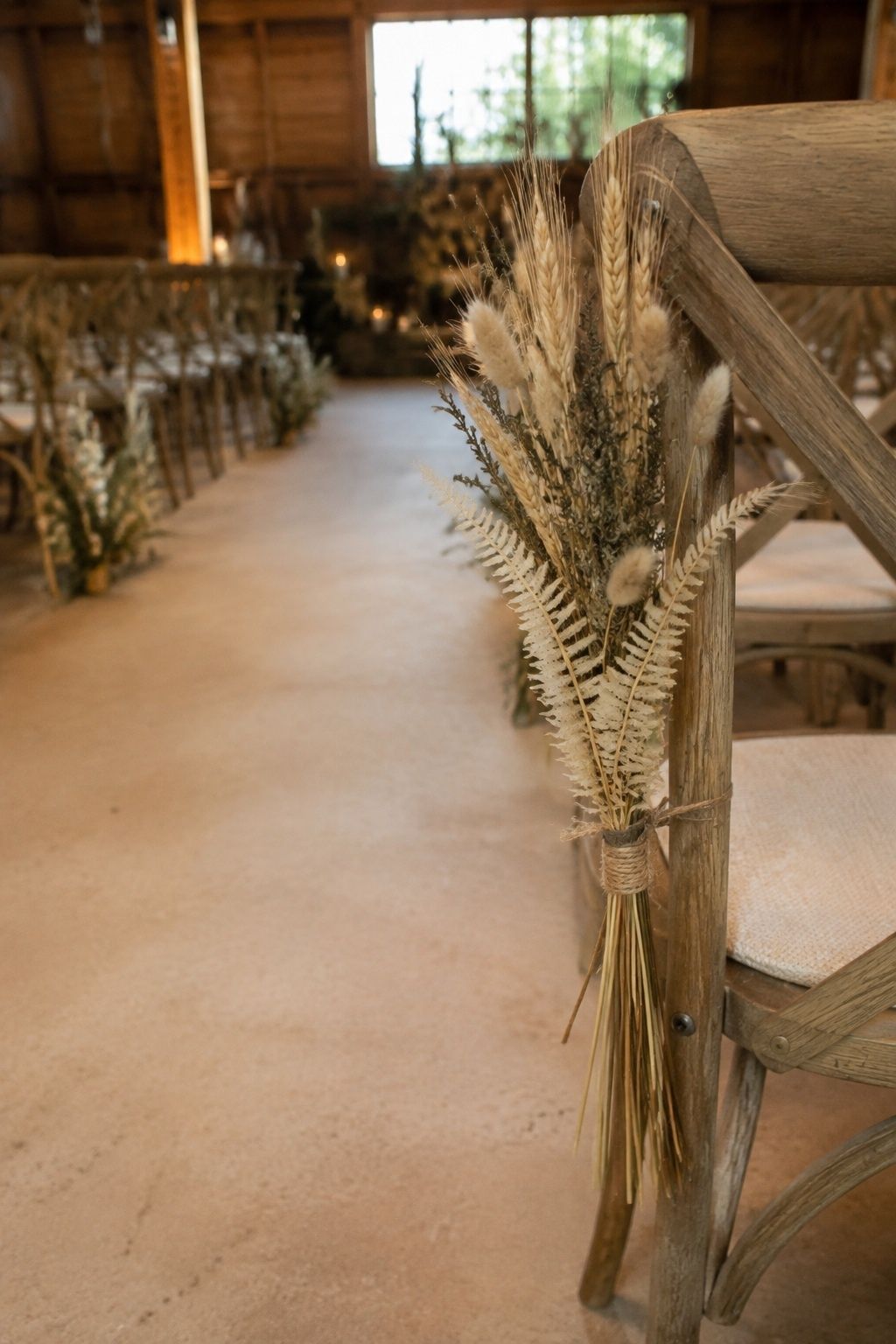 Dried grass bundles tied to ceremony chairs