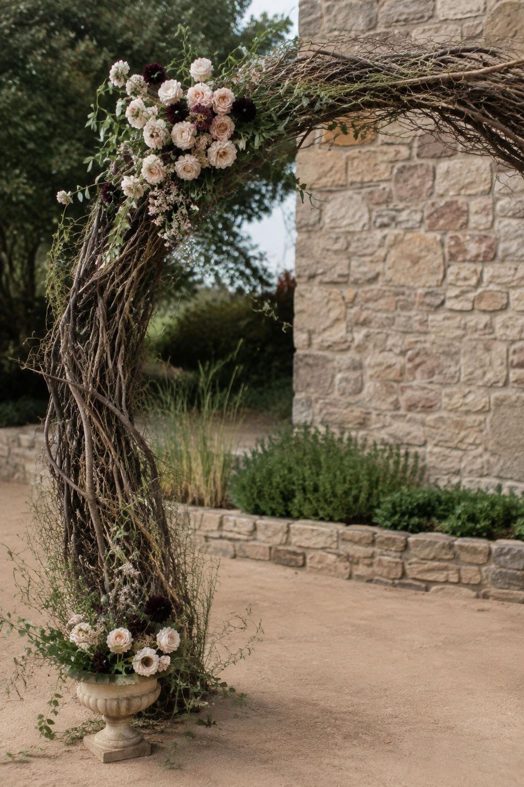 Vineyard-style arch with grapevine texture