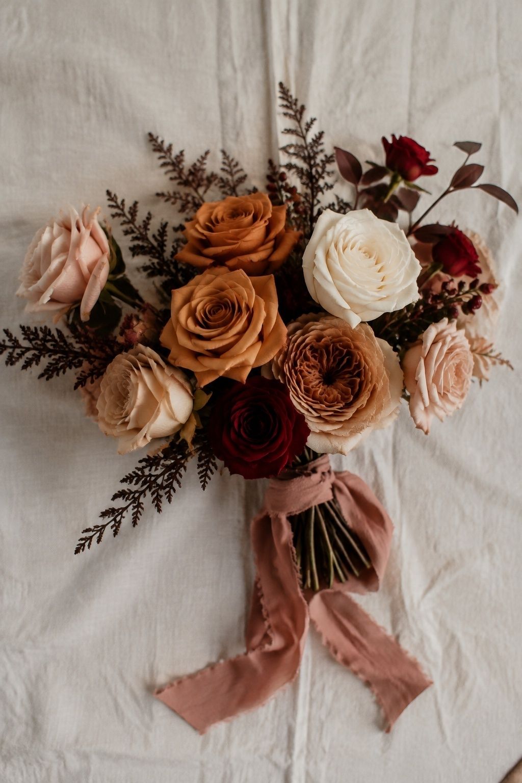 Toffee, cream, burgundy and blush rose bouquet