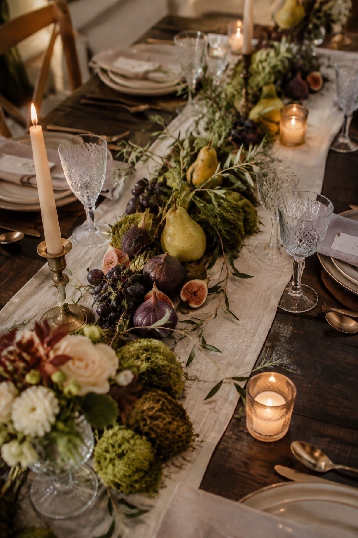 Fruit, herbs and branches styled on reception tables