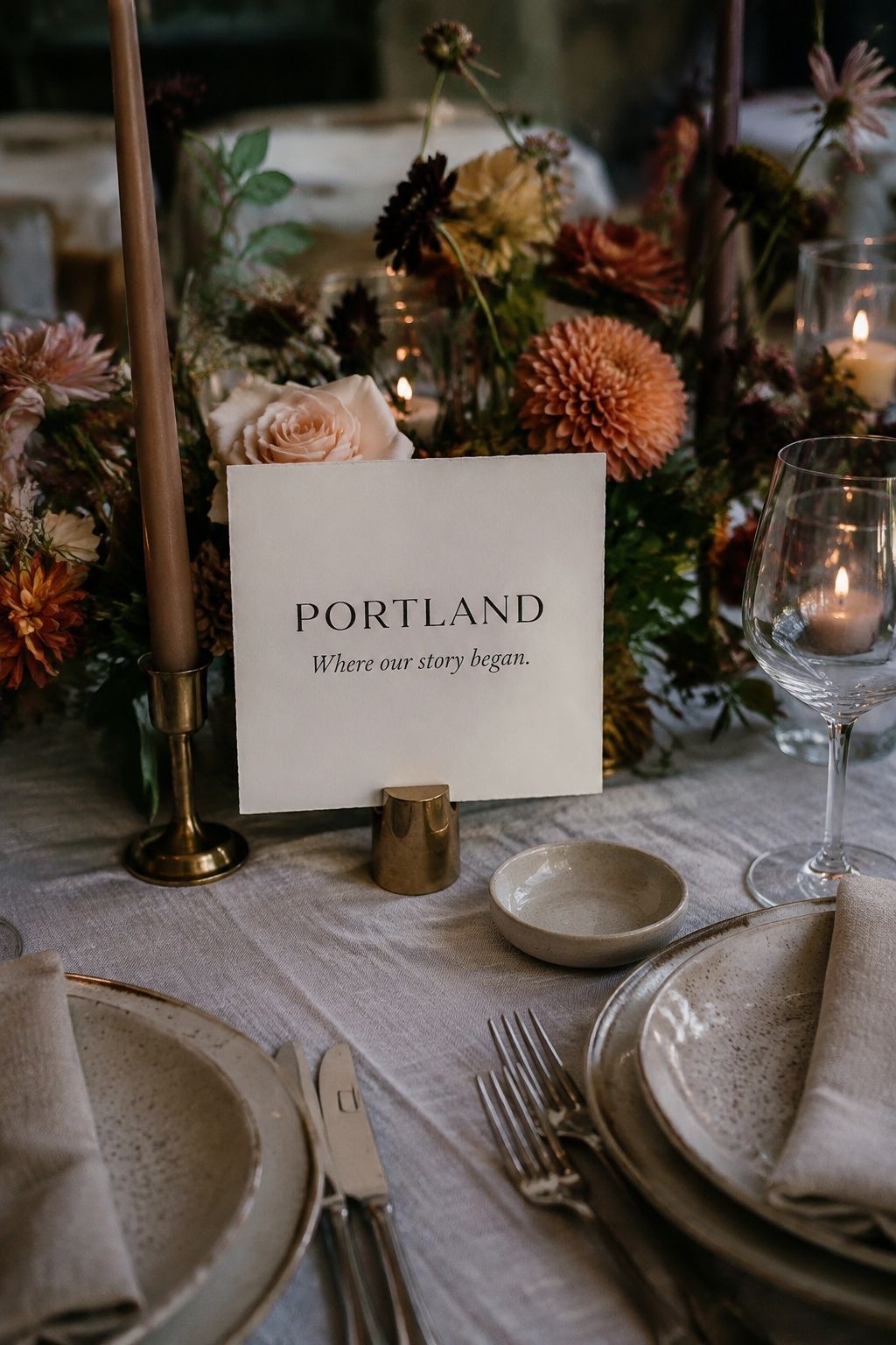 Portland table story card among fall wedding flowers and place settings