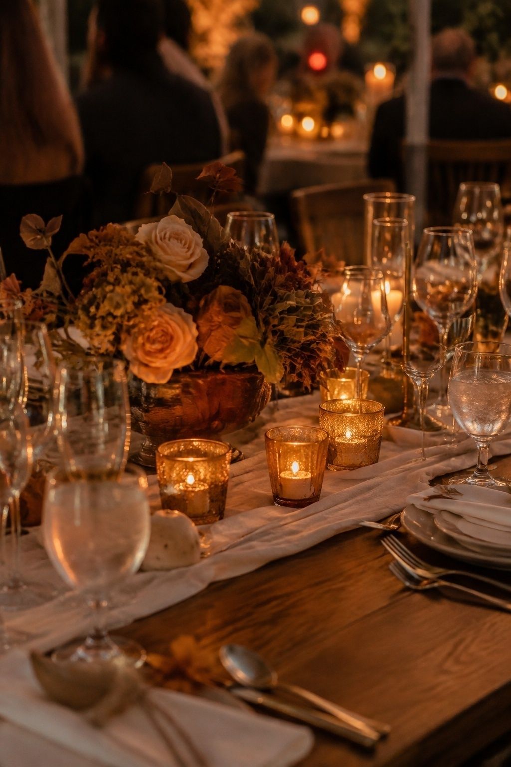 Amber votives giving warm evening light