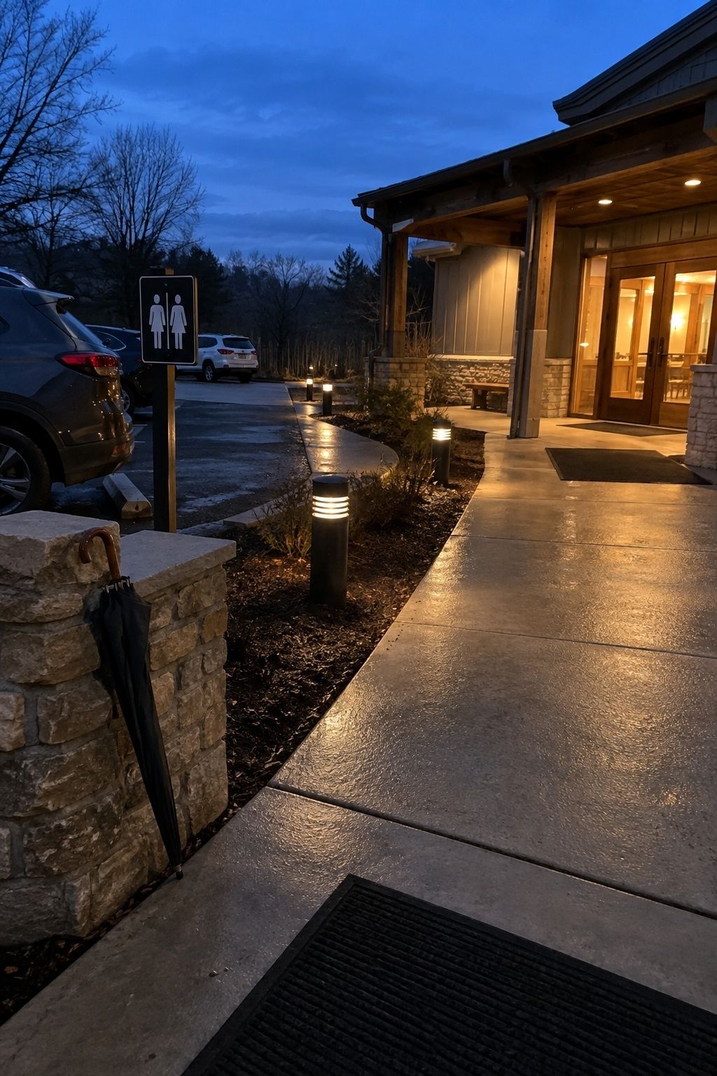 Electric path lights guiding February wedding guests from drop-off to reception