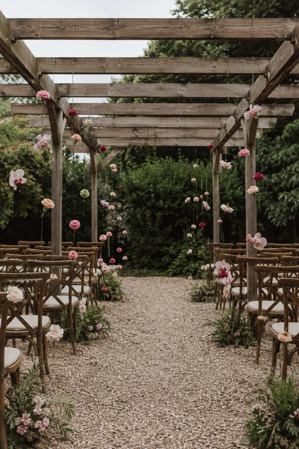 Floating flower strands along a ceremony aisle