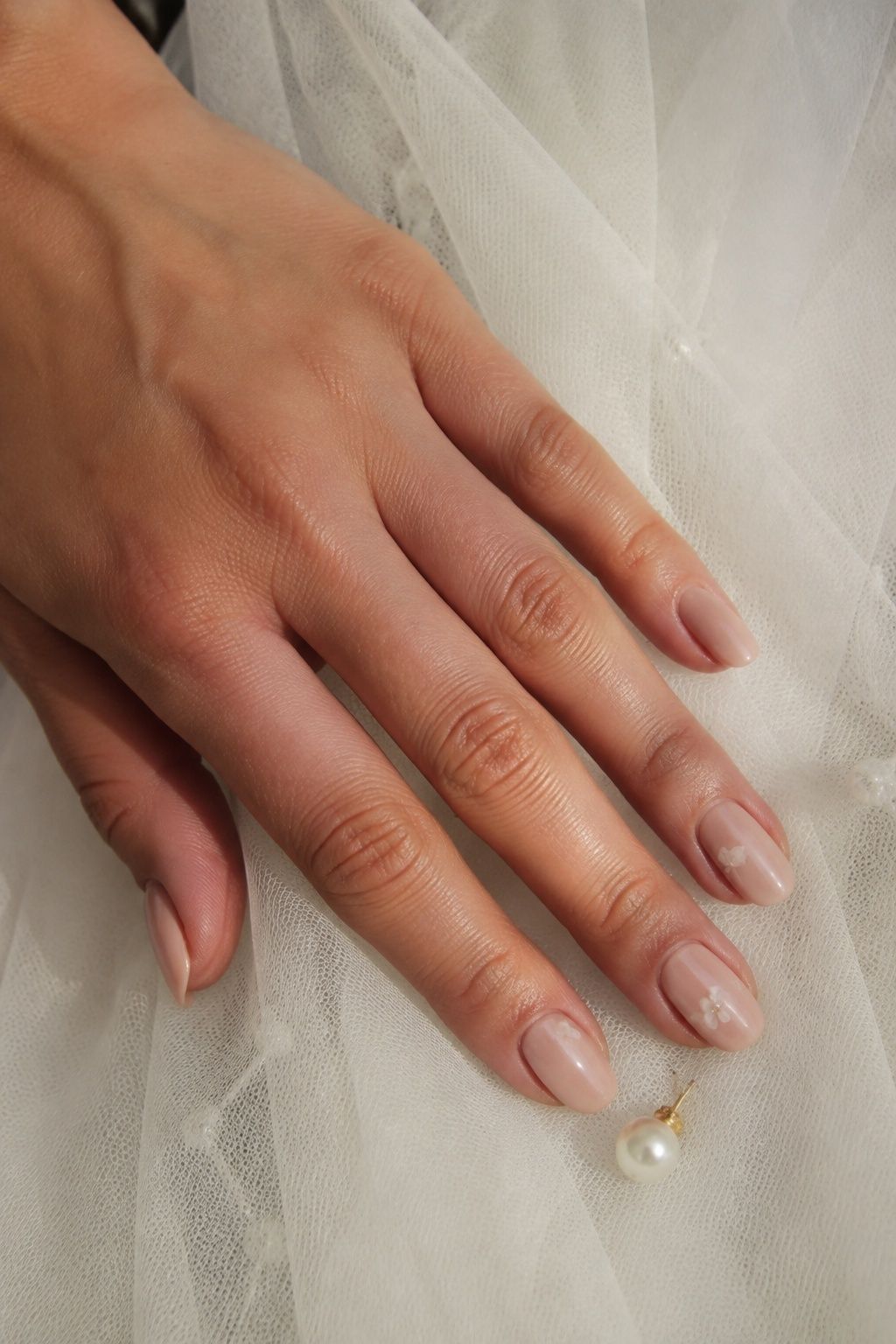 tiny Pearl Flower Details in a delicate bridal manicure