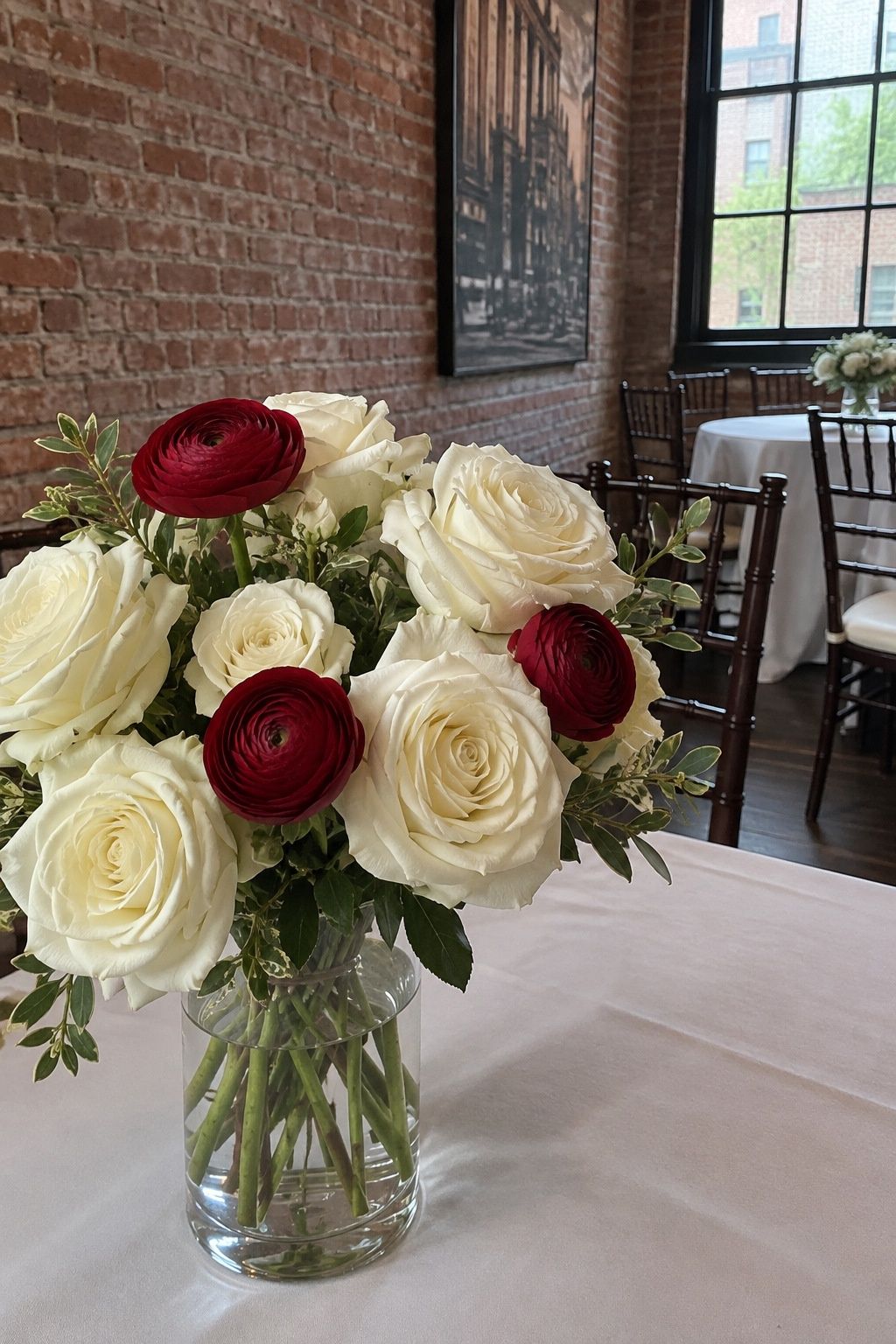 Red roses or ranunculus as accent blooms