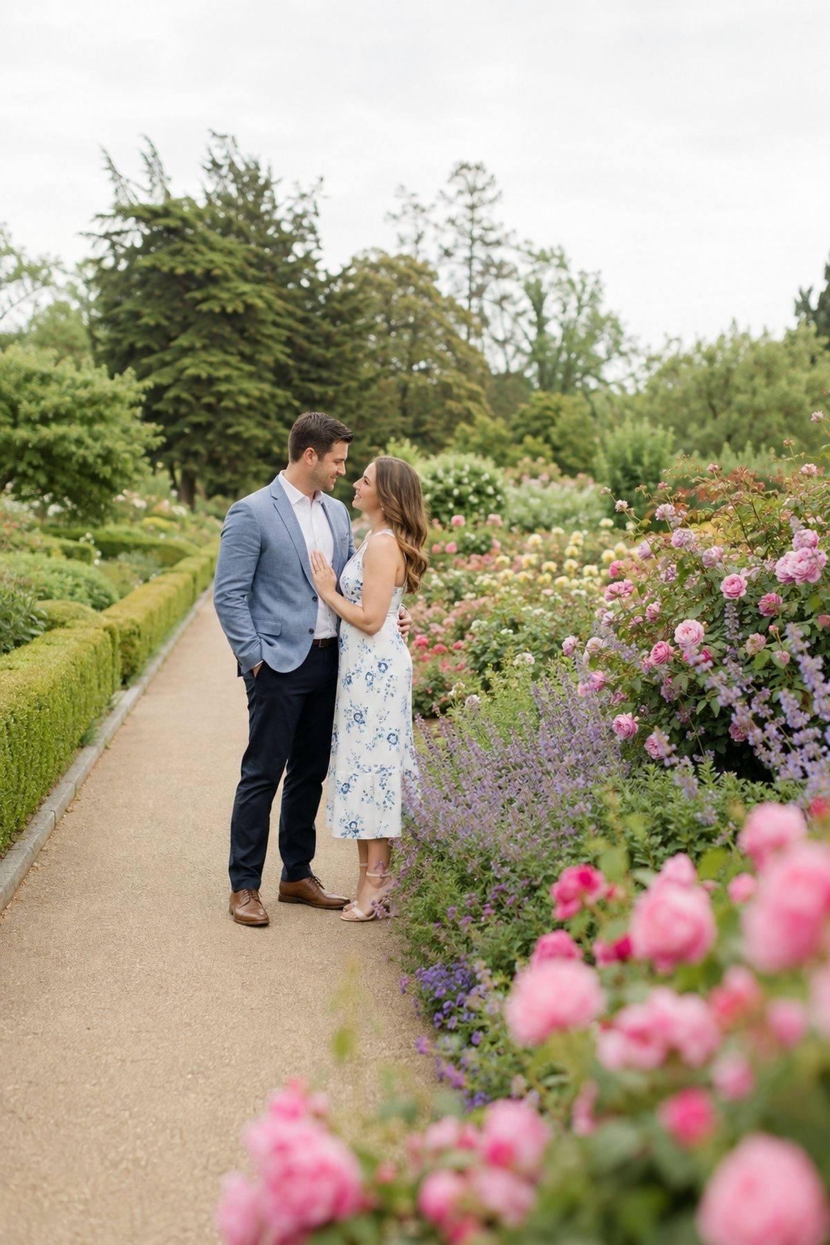 Flower beds adding colour behind the couple