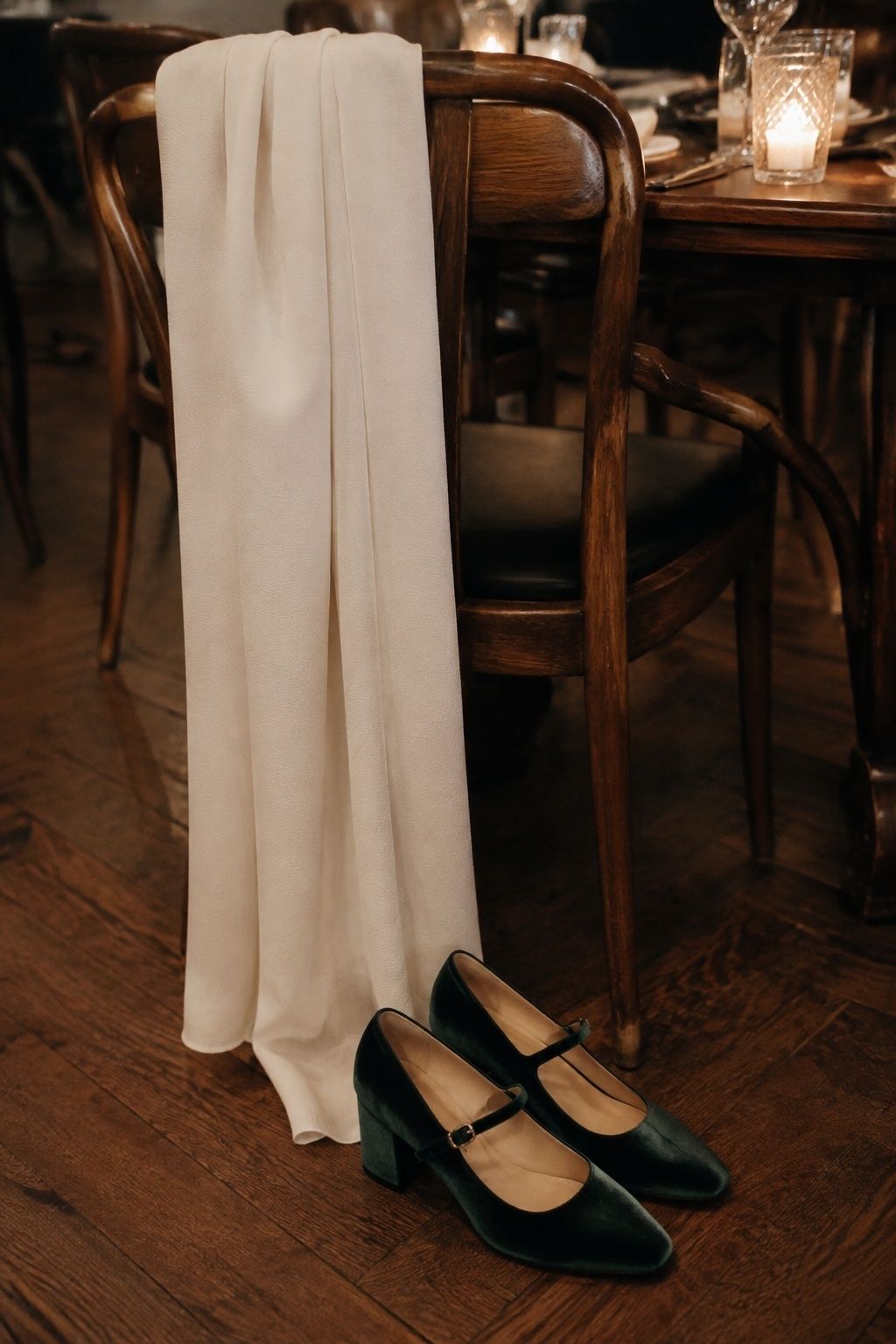 Hunter green velvet heels at a winter wedding dinner