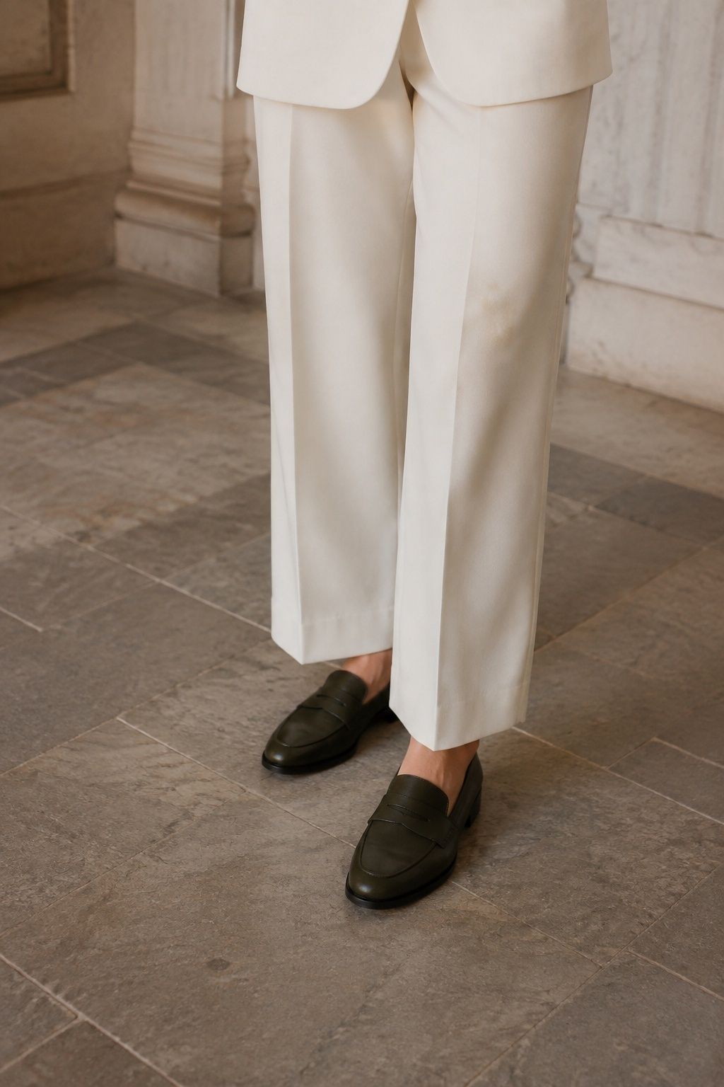 Green shoes worn with a bridal suit