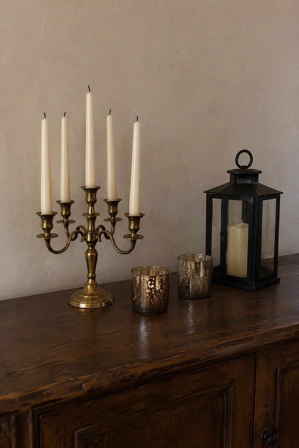Brass, mercury glass and black metal decor pieces