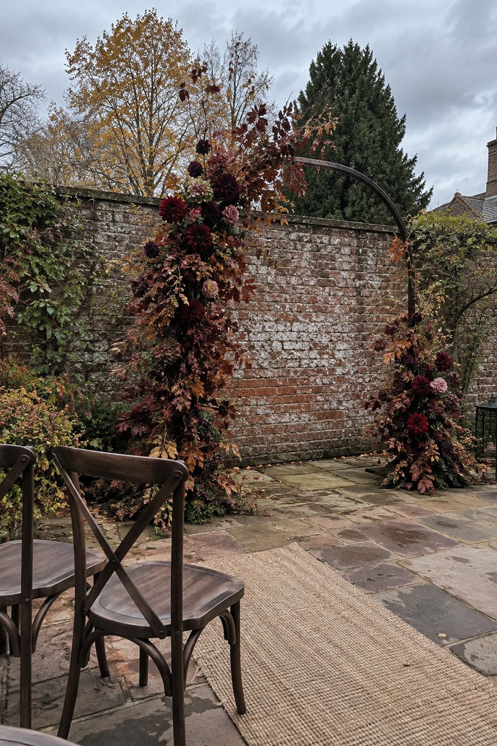 Dark floral ceremony arch