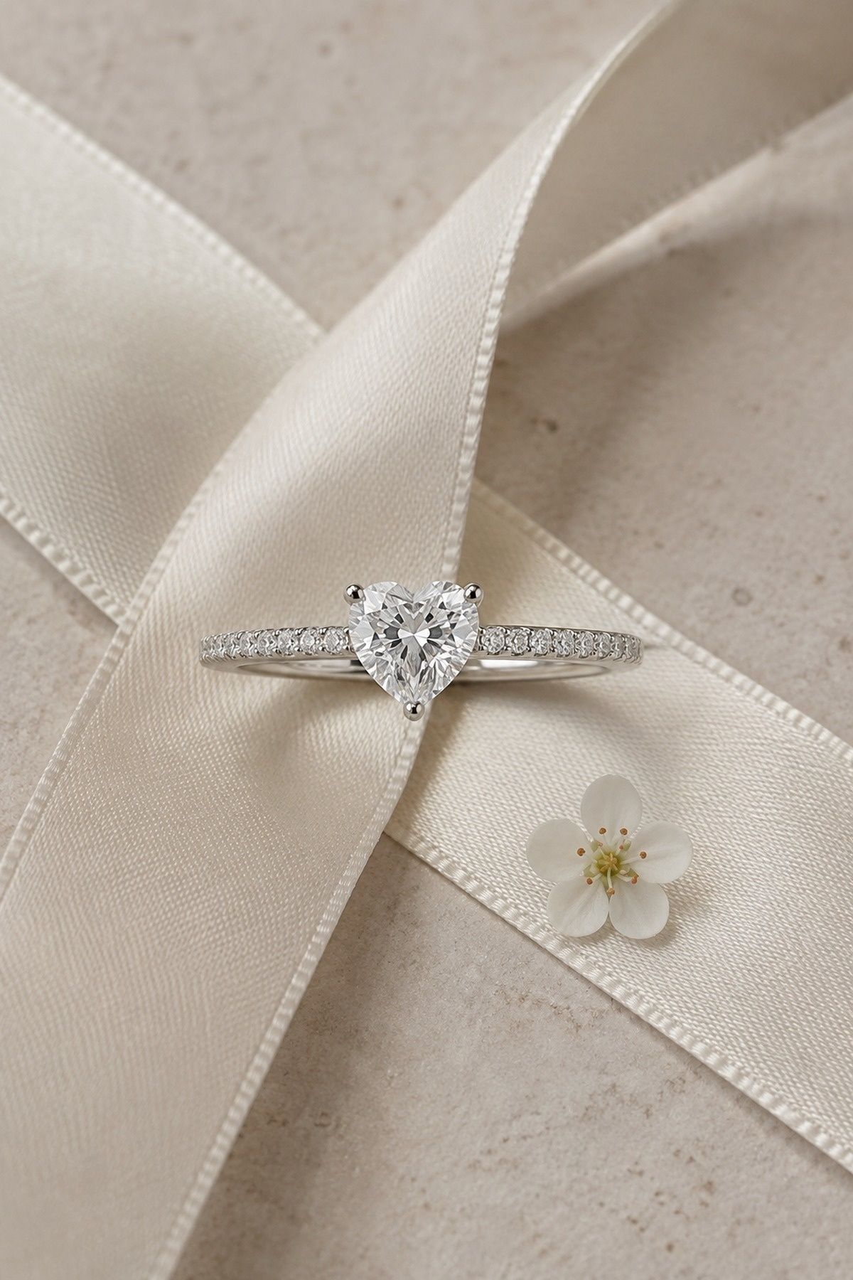 Minimal heart ring on a thin pave band