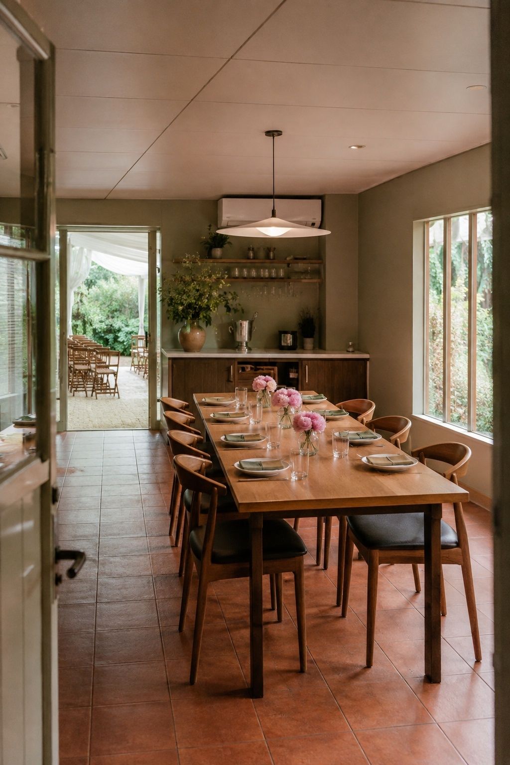 Intimate restaurant wedding dining room with existing furniture and garden access.