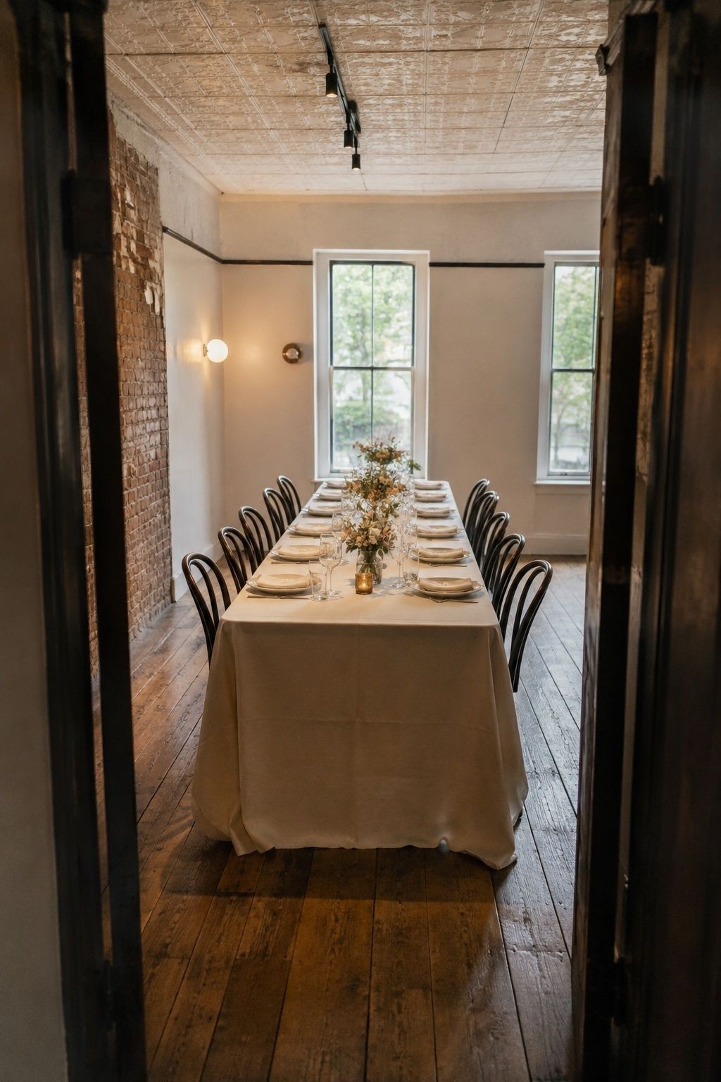 Intimate restaurant wedding table with clear space for service
