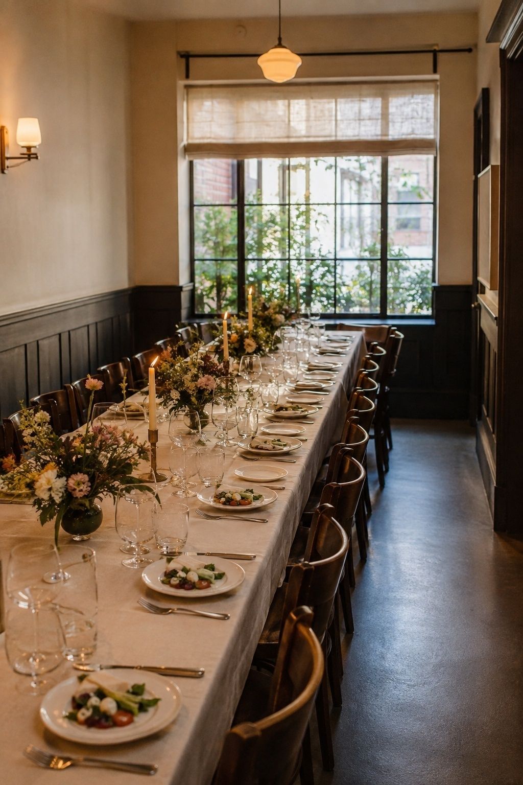 Intimate private dining room wedding venue with a long hosted table