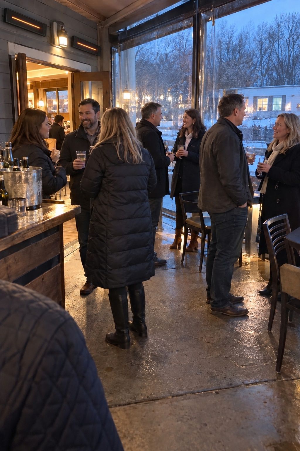 Brief heated patio cocktail hour beside an indoor January wedding reception