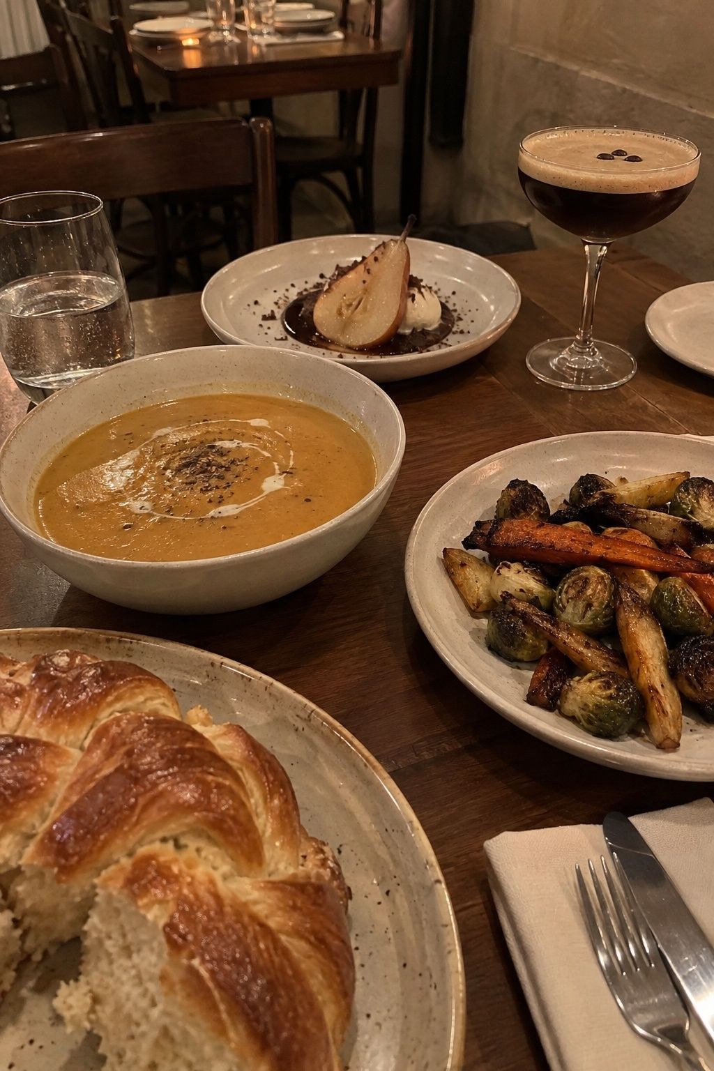 January wedding menu with soup, roasted vegetables, bread, pear dessert, and an espresso martini.