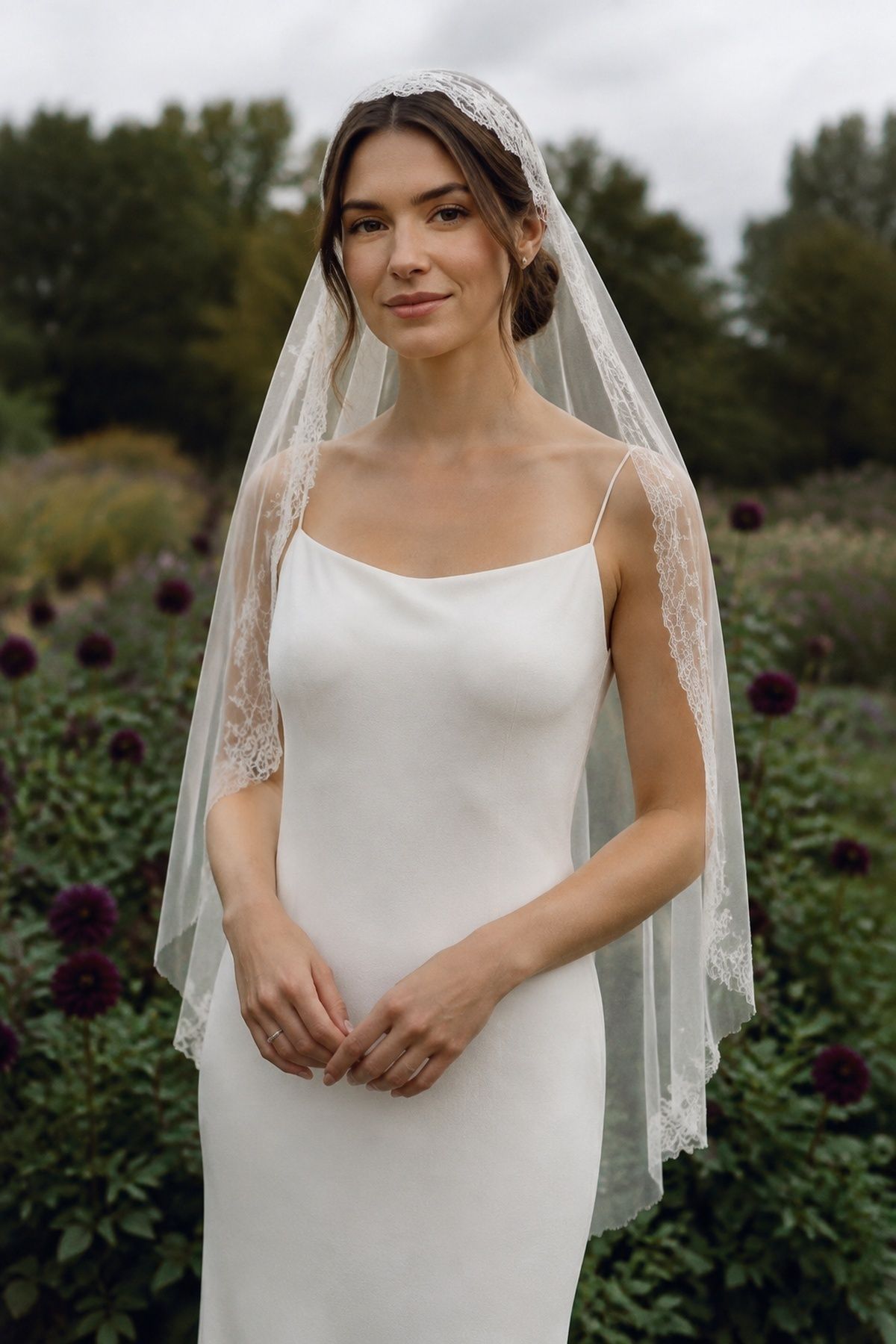 Lace Juliet cap veil with a simple gown