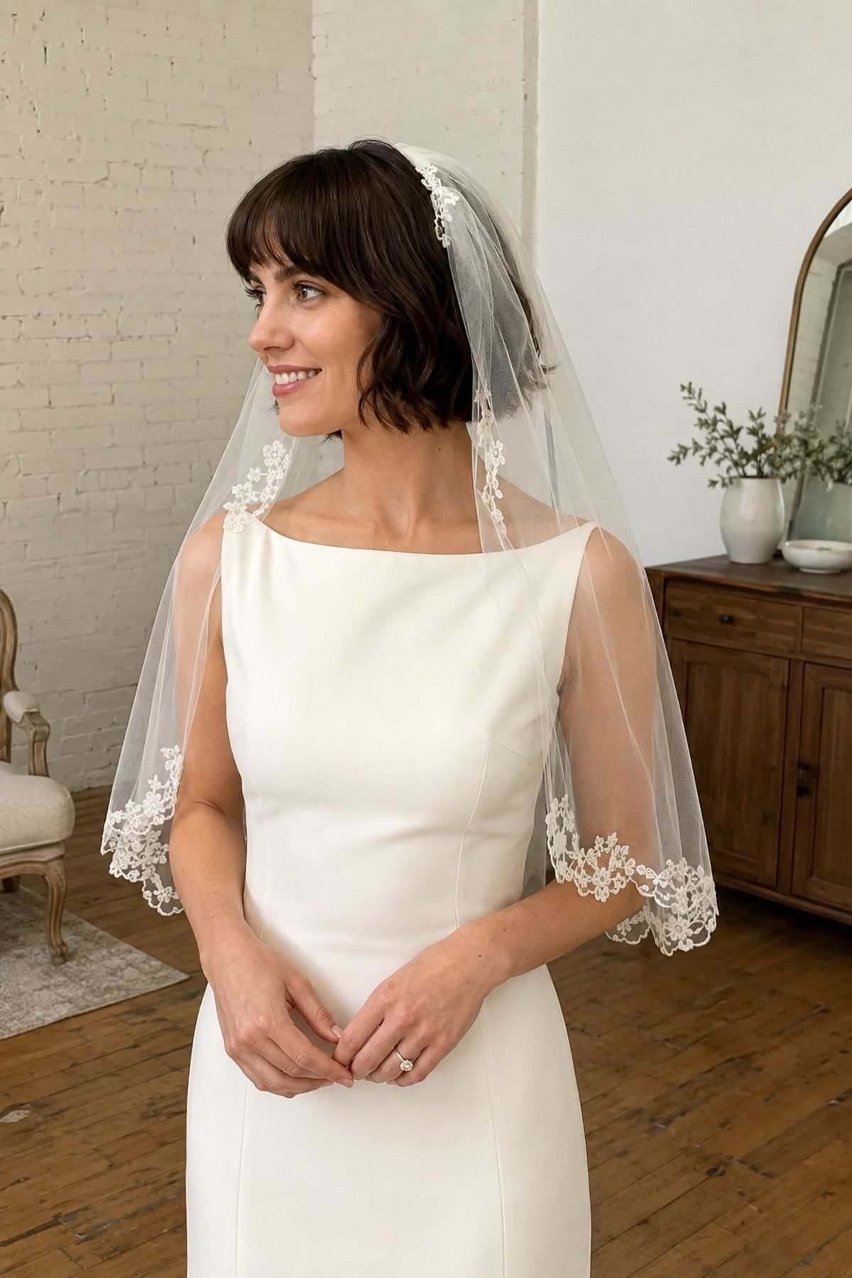 Juliet cap veil worn with bangs