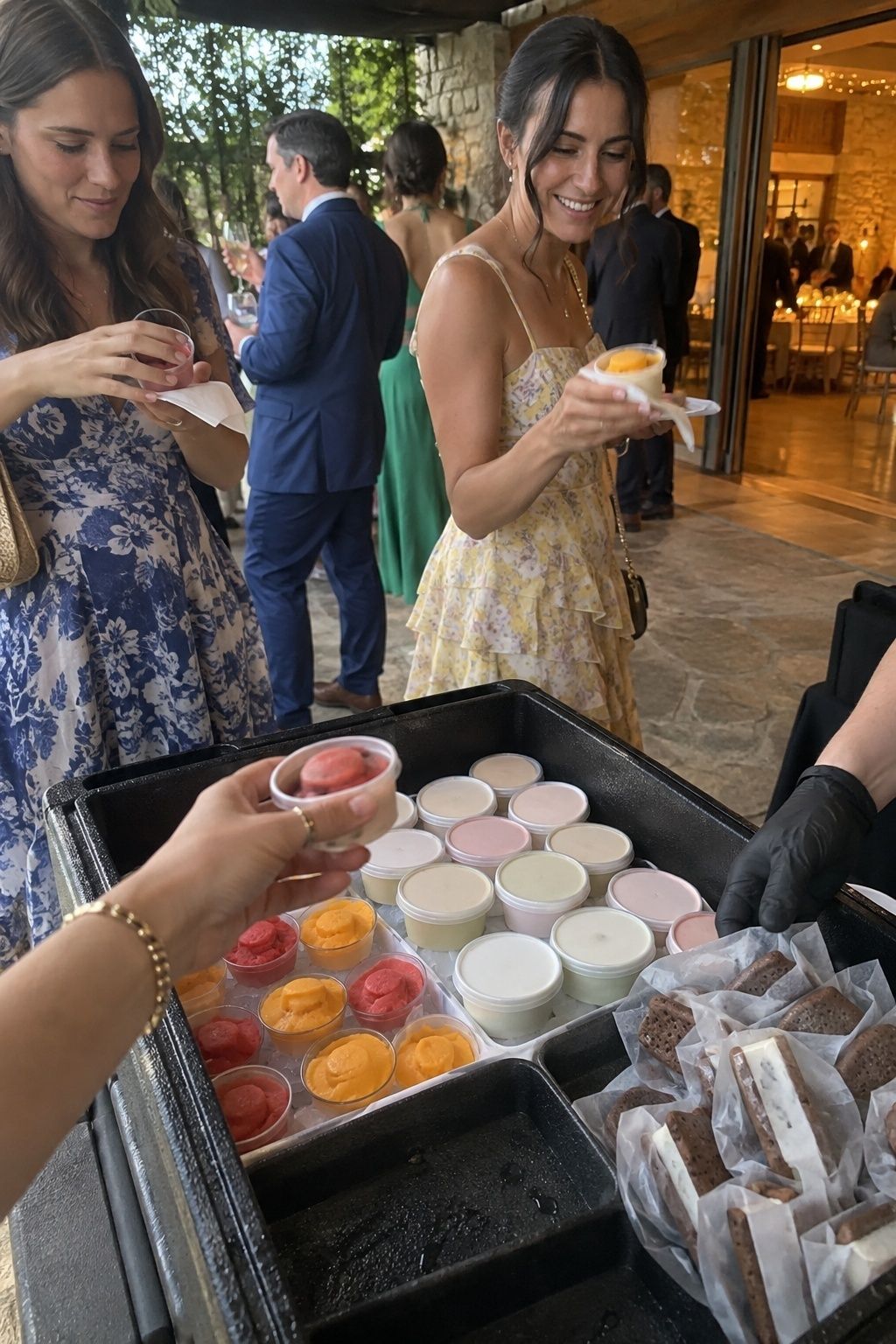 Frozen sorbet, gelato cups, and ice cream sandwiches served at a July wedding