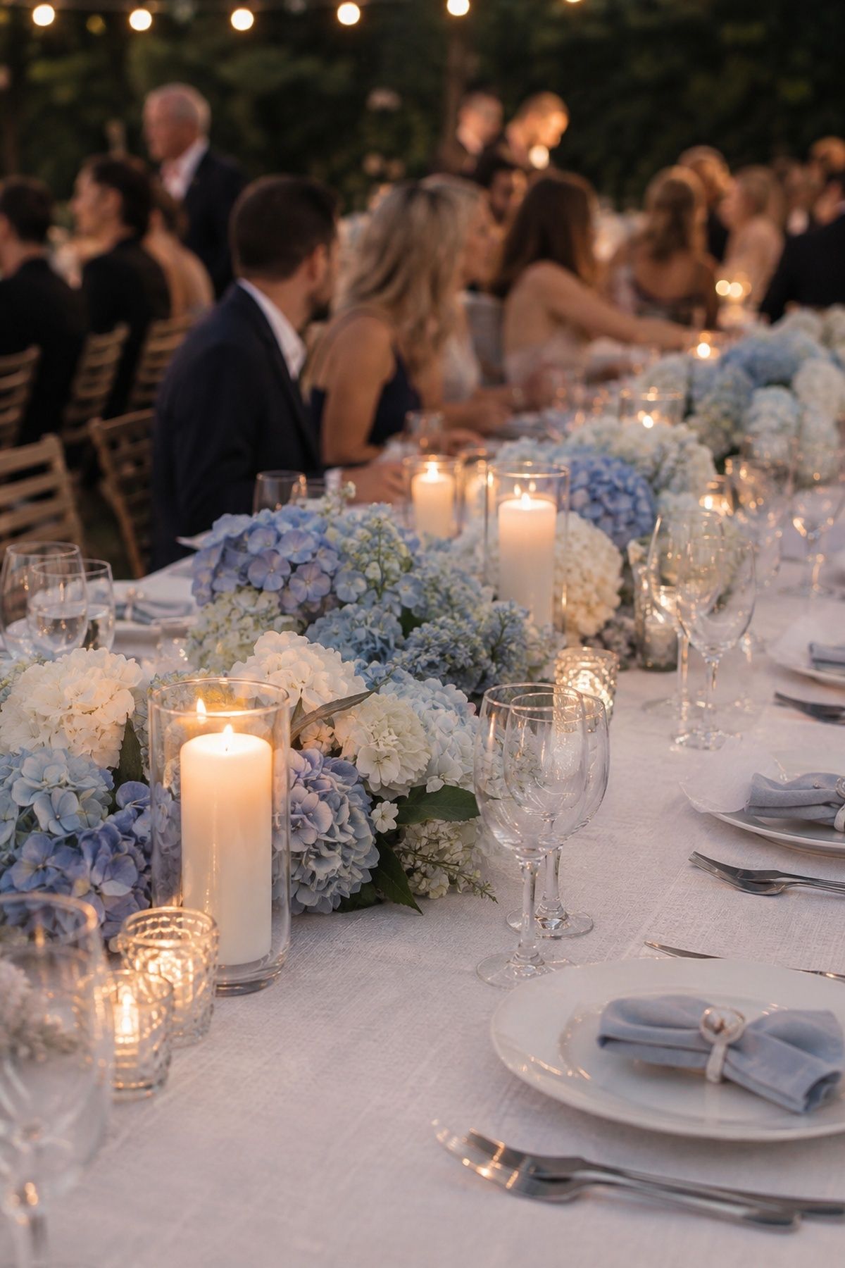 Hydrangeas clustered with candles