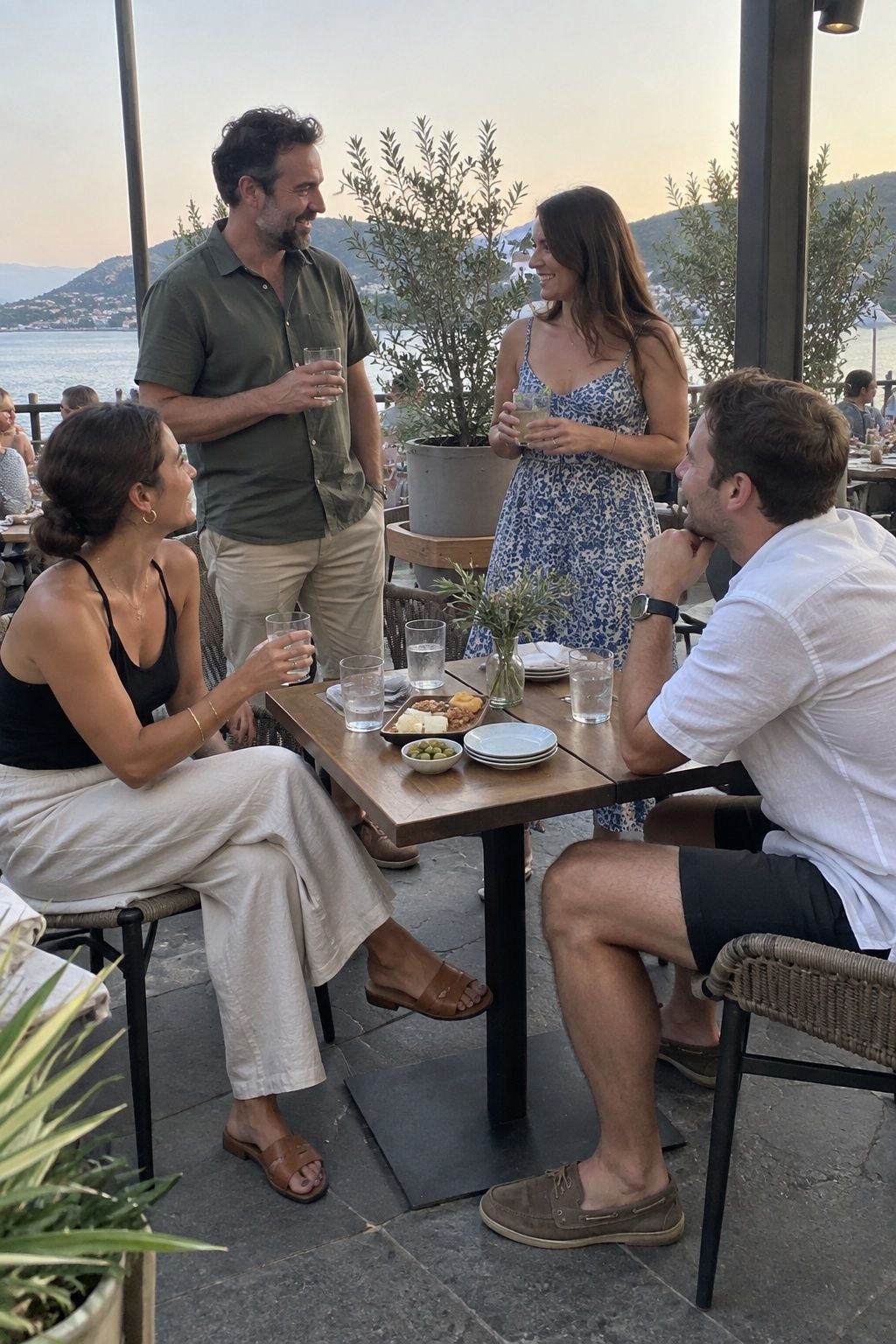 Small relaxed welcome gathering on a restaurant patio for a Labor Day wedding