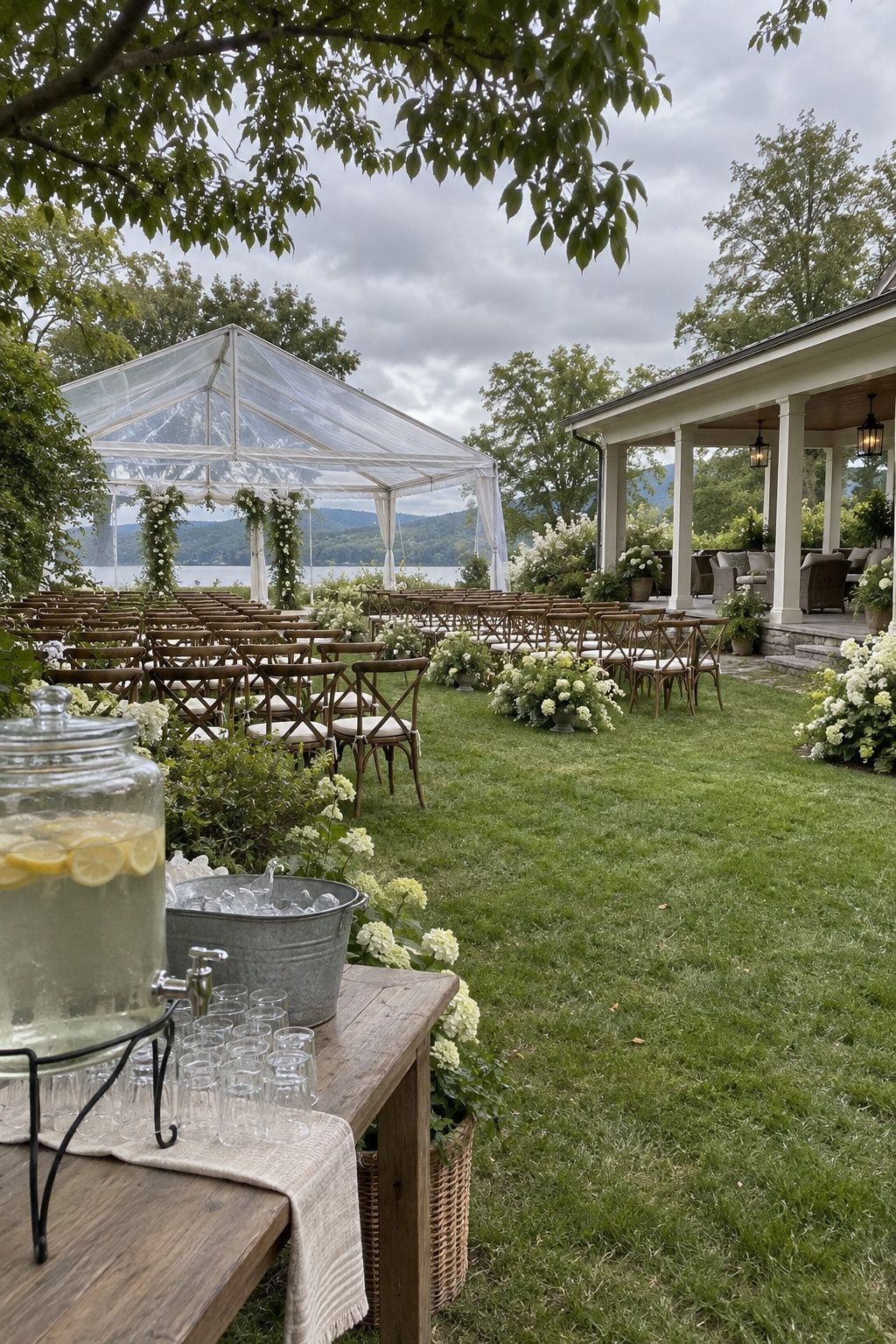 Garden ceremony with shade, clear-span tent and covered porch for a Labor Day weekend wedding.