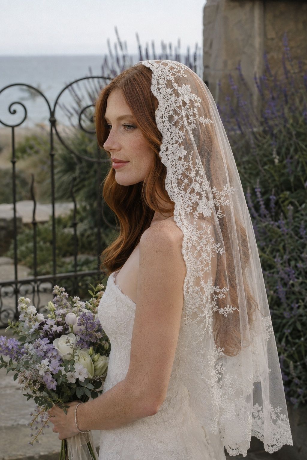 Soft red waves visible beneath a lace mantilla in a chapel garden
