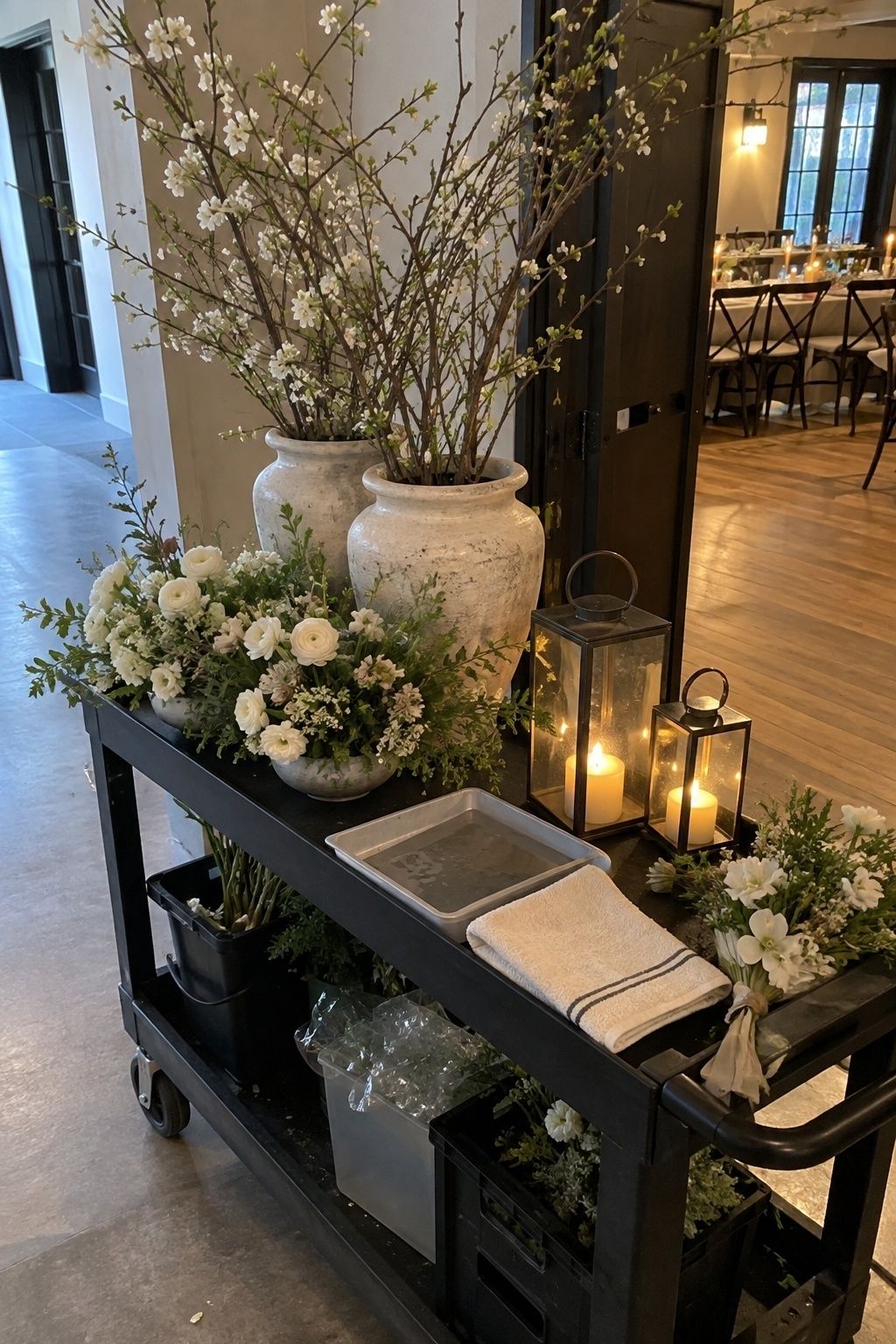 Movable March wedding ceremony flowers and lanterns on a service cart