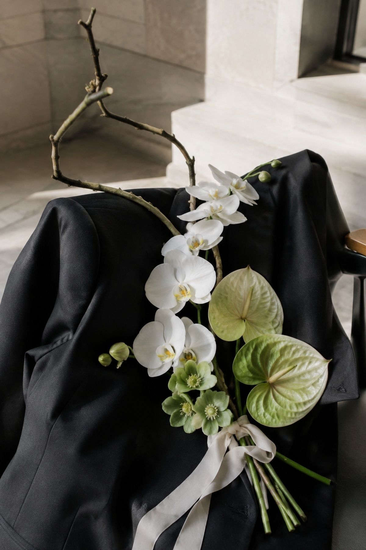 Sculptural bouquet of branches and blooms